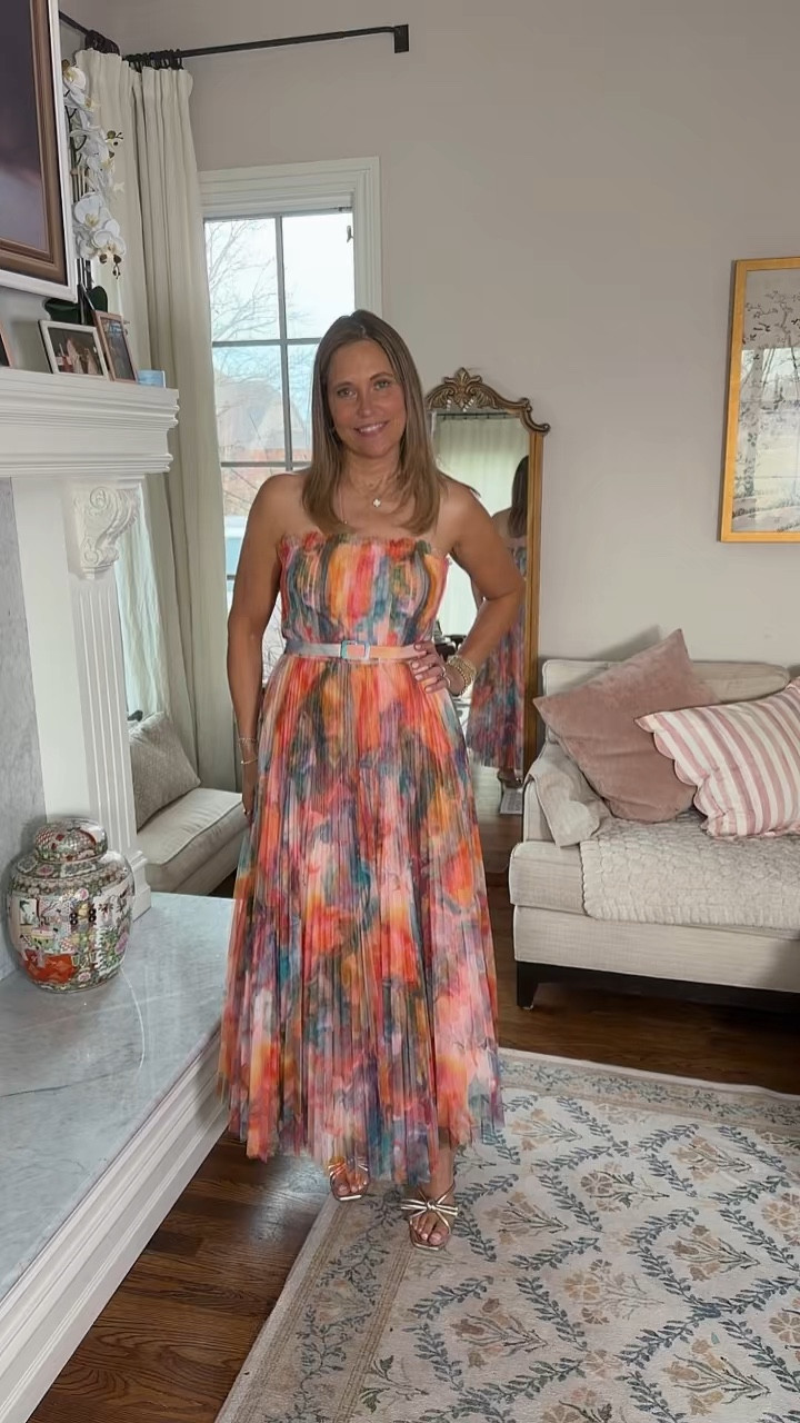 Such a pretty pleated strapless dress. Thjs orange and pink makes such a statement  

#LTKSeasonal #LTKOver40