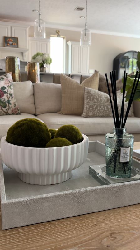 Coffee ta or views! Loving my Walmart bowl with the moss balls! Such a cute addition to a vignette. I linked all my coffee table decor,  throw pillows and sofa in my living room. 

#LTKVideo #LTKSeasonal #LTKhome