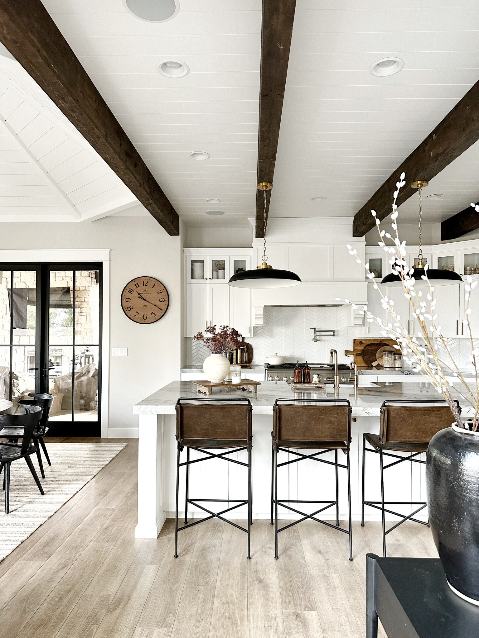 Modern rustic home. Kitchen decor. Floral. Brown barstools. Wall clock. Pendants  

#LTKFind #LTKunder100 #LTKhome