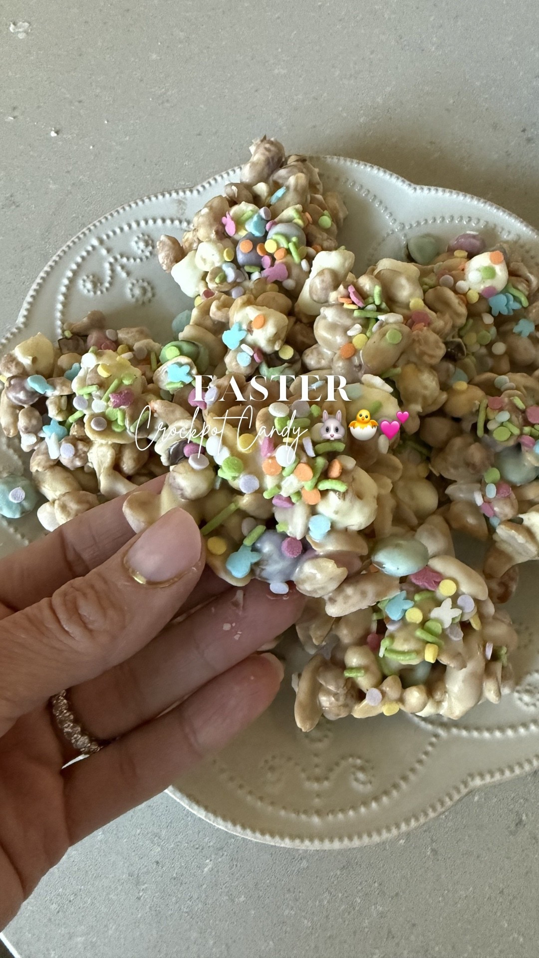 Make Easter Crockpot Candy with me! 🐣🐰💕 This was my first time making this recipe and it turned out so good 👌🏻 Easy and quick & will make a perfect little Easter/ spring sweet treat! My kids all loved it 😍 

Ingredients 
• 16 ounces of roasted salted peanuts
• 16 ounces of honey roasted peanuts
• 20 ounces of white chocolate 
• 1 ½ cups of mini marshmallows
• 1 cup of Easter M&Ms
• Easter sprinkles 

1. Pour both jars of peanuts into the crockpot 
2. Pour the white chocolate wafers on top of the nuts
3. Put the lid on, turn the crockpot on low for 1 hour
4. Stir making sure the chocolate is nice & smooth. (You can let it cook longer if it’s still lumpy)
5. Let the mixture sit for about 30 minutes to cool
6. Once cool, fold in the marshmallows & M&M’s
7. Line baking sheets with parchment paper and use a spoon to scoop spoonfuls onto the parchment paper. 
8. Add sprinkles to each before the harden or completely cool
9. Let sit at room temperature for about an hour or put in the refrigerator for 30 minutes if you need to speed things up! 

Easter desserts, Easter treats, Target, Amazon, Easter dinner, Easter brunch, Easter dessert, spring dessert ideas, crockpot recipes 

#LTKfoodie #LTKSeasonal #LTKmomlife