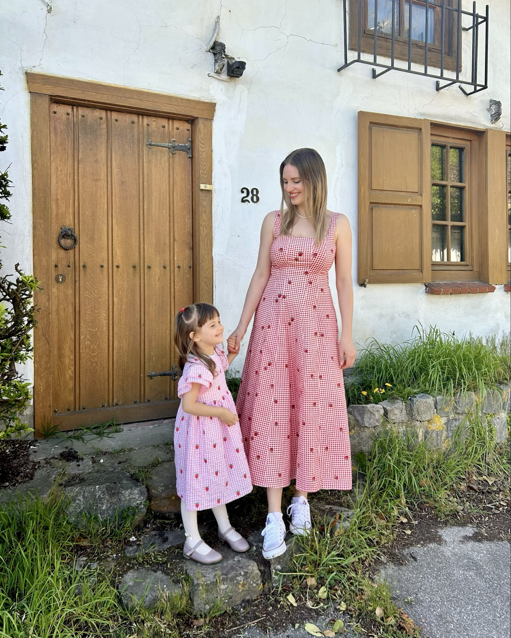 At the 300 year old farm of my lovely grandparents 🤍 Even though they went to Heaven several years ago, I still visit their farm every time I go to Belgium. They had 9 children and worked so hard their entire life, had to take care of lots of cows, donkeys and other animals, their own vegetable garden, large corn fields, and then my grandma still had to cook from scratch every day, she made everything by herself, wash everything by hand, and knitted for all her children. I can’t believe how my grandparents did all this! I find raising my 4 children really hard and tiring already, but they had 9! I’m really inspired by them. I wish they were still here. There are so many things I’d like to ask them and learn from them ♥️

My cotton strawberry dress is from @abercrombie #LTKxAFSale
My girls’ cotton strawberry dresses are from JoJoMaman via @marksandspencer 
Girls shoes by @Clarks US 

#family #momof4 #history #tradition #farmhouse

#LTKsale #LTKdresses #LTKxAFSale