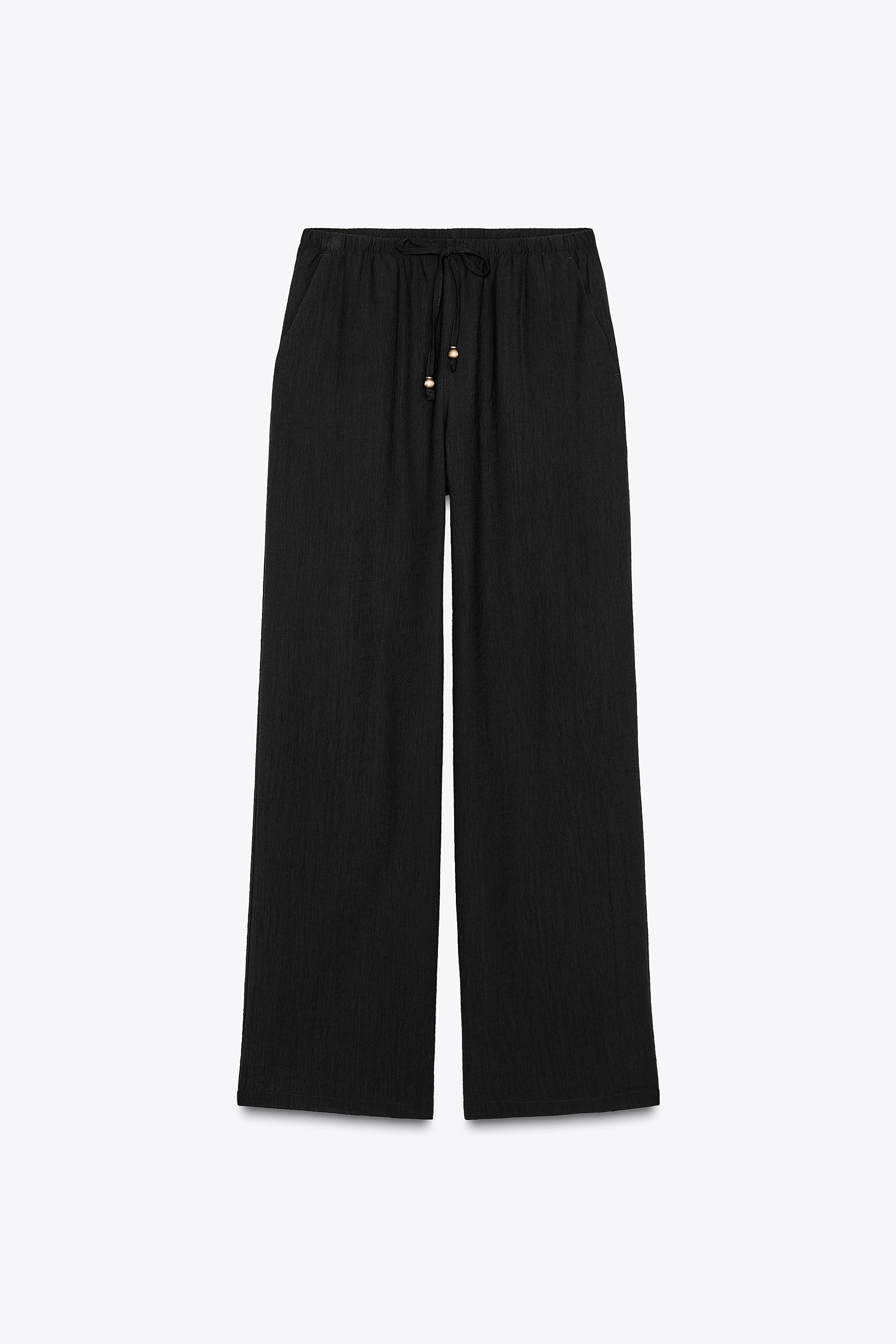 WIDE-LEG TROUSERS WITH ELASTIC WAISTBAND | Zara UK