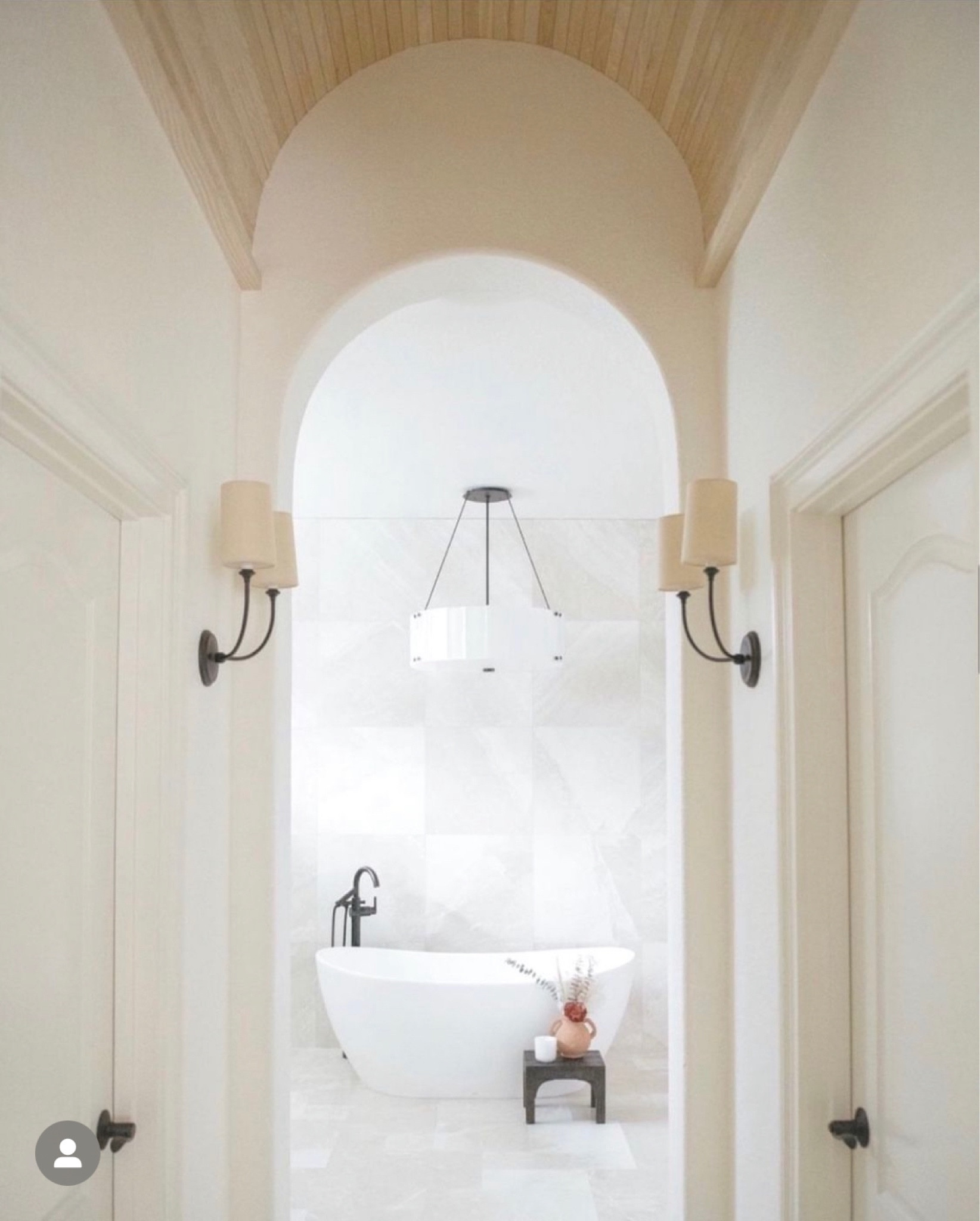 Layered lighting in our #lakefrontvilla project. We kept the metals consistent but mixed up the shade texture for a very flattering look. 

#LKTbathroom #LKTlighting #LKThome
