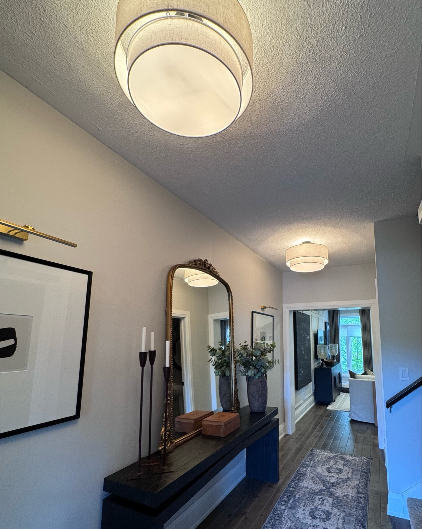 These new hallway lights are stunning. I cannot believe what a difference they make to this entryway. They are large at 20” round and a beautiful warm linen color. A little more expensive than others online but so worth it!  Now I need to find a new rug!

#LTKcanada #LTKhome