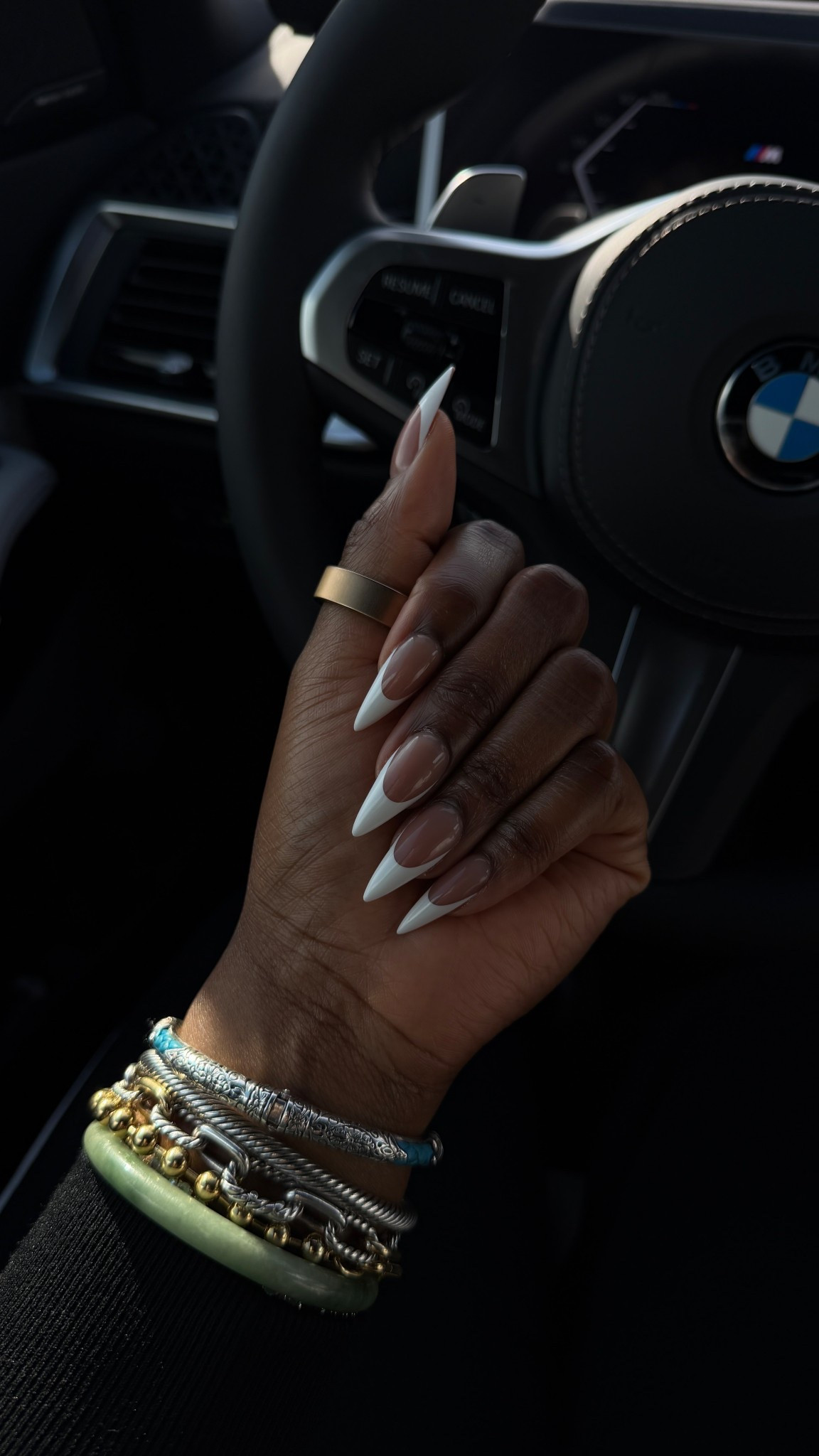 I’ve been hooked on these french tips stiletto press on nails for years and I love them! Also get into this bracelet stack.