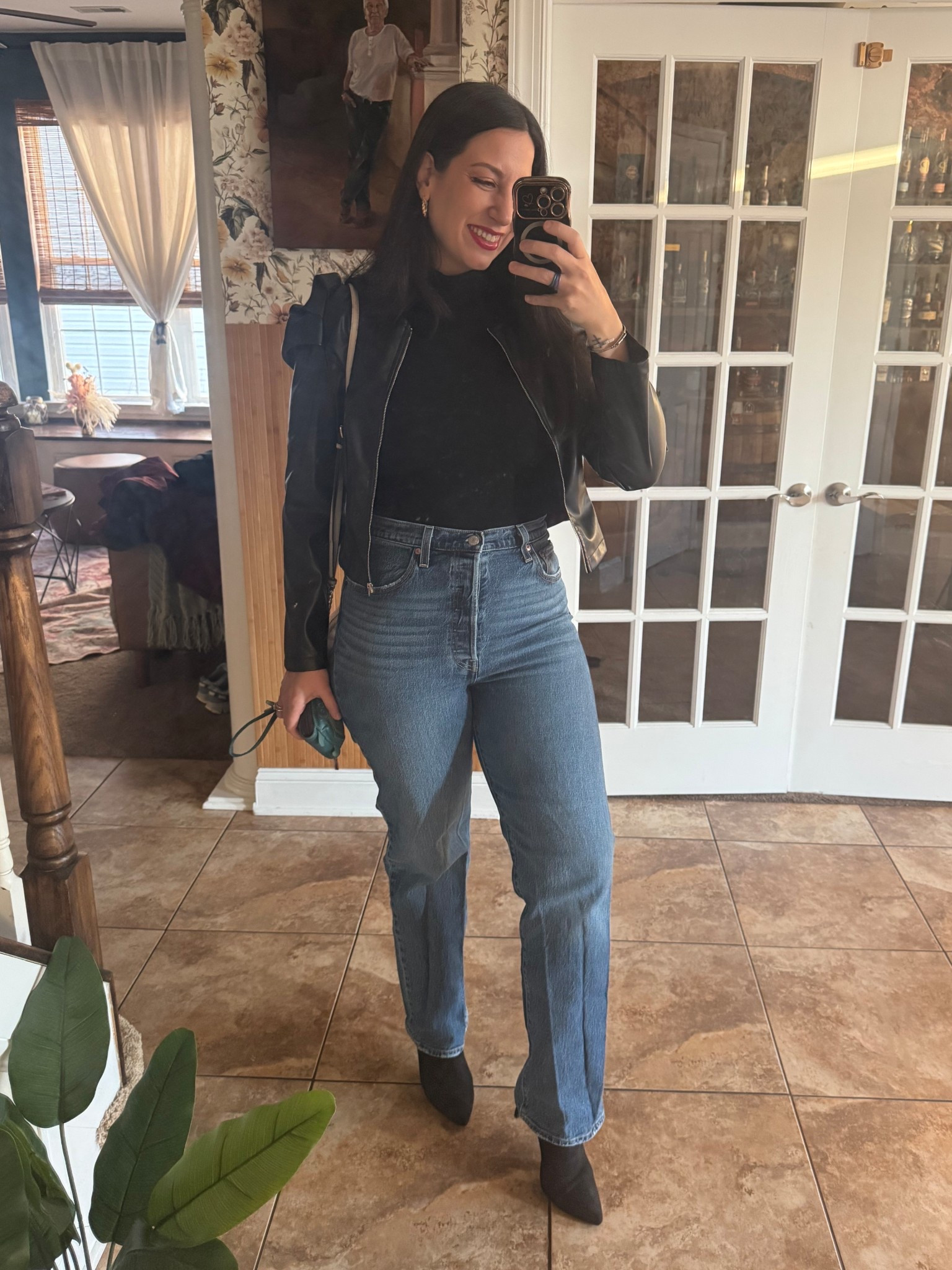 I wore this to a work event for my husbands work. I wasn’t sure if dress code so I thought a nice pair of jeans and elevate with a leather jacket and heels would do the trick. Not pictured: I added a belt. I am wearing size 31 in jeans. 

#LTKWorkwear #LTKMidsize #LTKootd