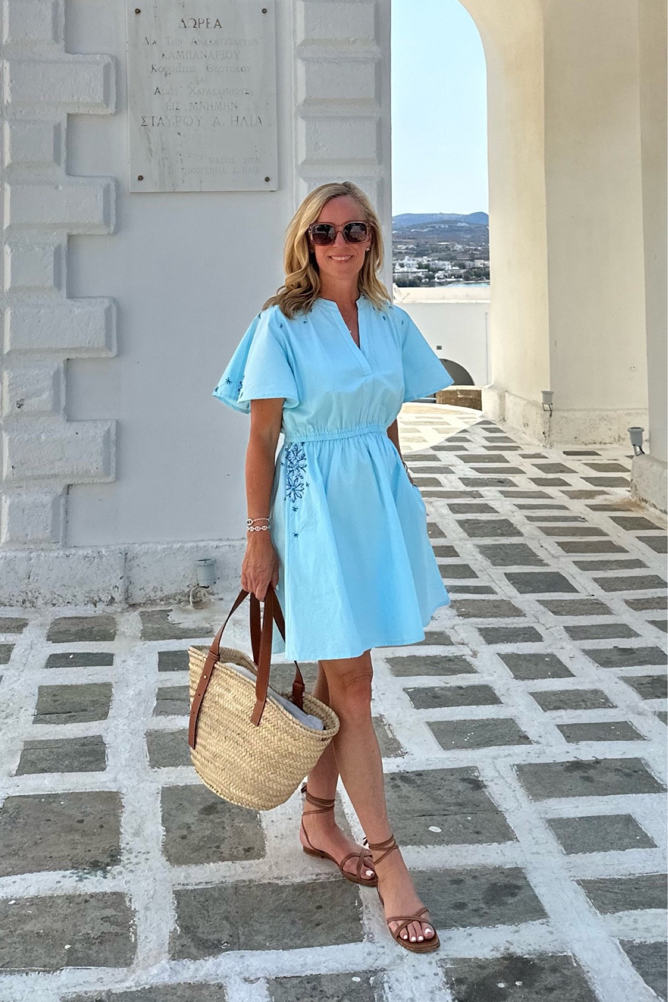 Light blue cotton dress with blue and white embroidery from Cartolina 
Fits TTS 
Beach vacation 
City sightseeing 
Basket beach bag 
Margaux Brown leather wrap sandals 
Nude clear sunglasses Maui Jim 

#LTKSeasonal #LTKFind #LTKshoecrush