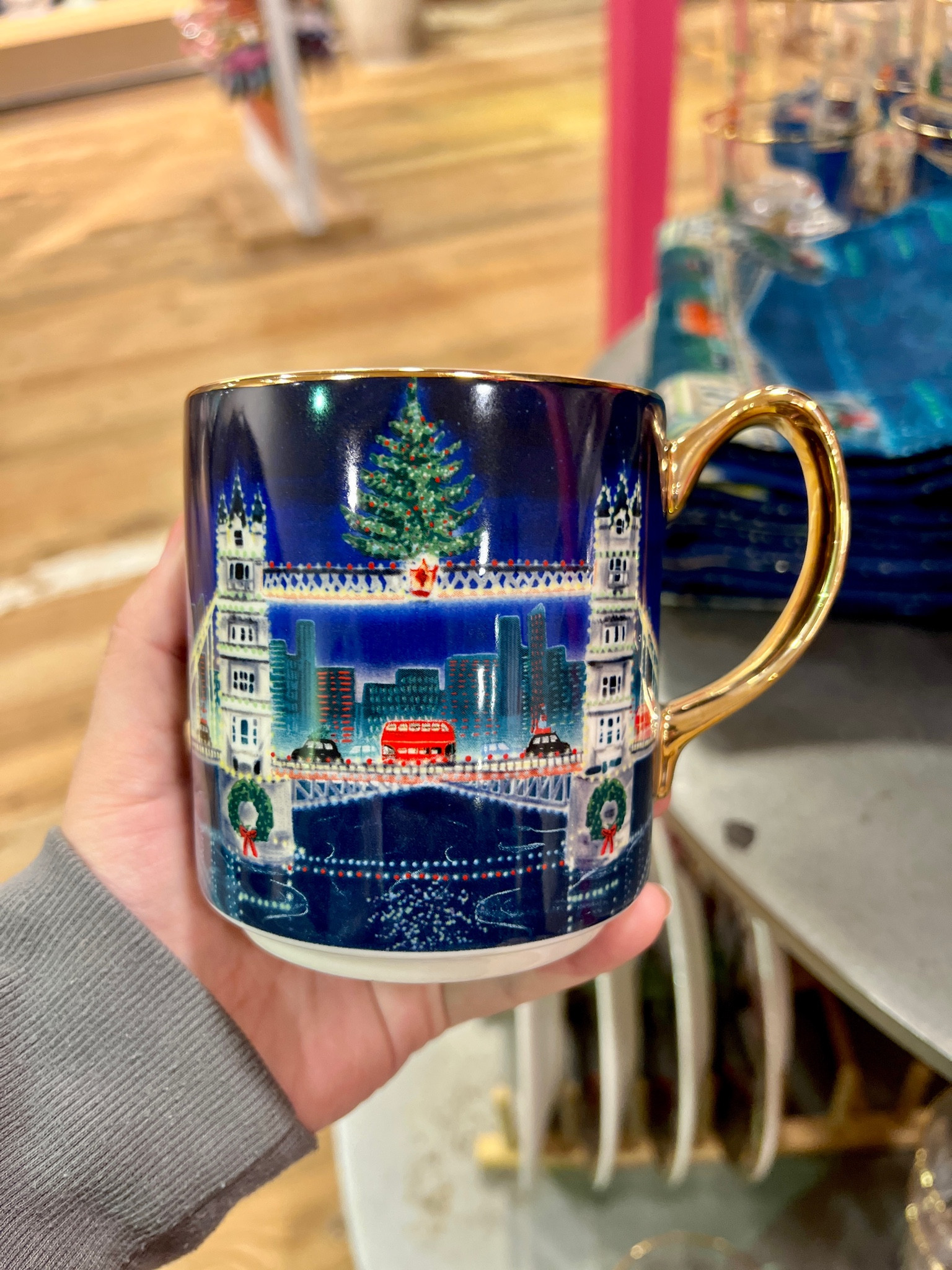 Holiday In The City Mug at Anthropologie 
Has multiple cities and designs 

#LTKhome #LTKHoliday #LTKGiftGuide