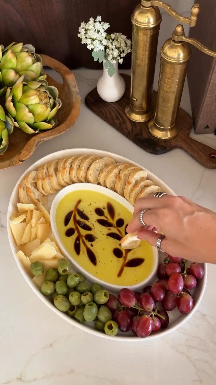 My olive oil and balsamic dipping platter

FINALLY back in stock after months of being sold out everywhere.

This olive leave pattern on this tray is so gorgeous, and the platter itself holds a generous amount of food for dipping.

#LTKHome #LTKfoodie