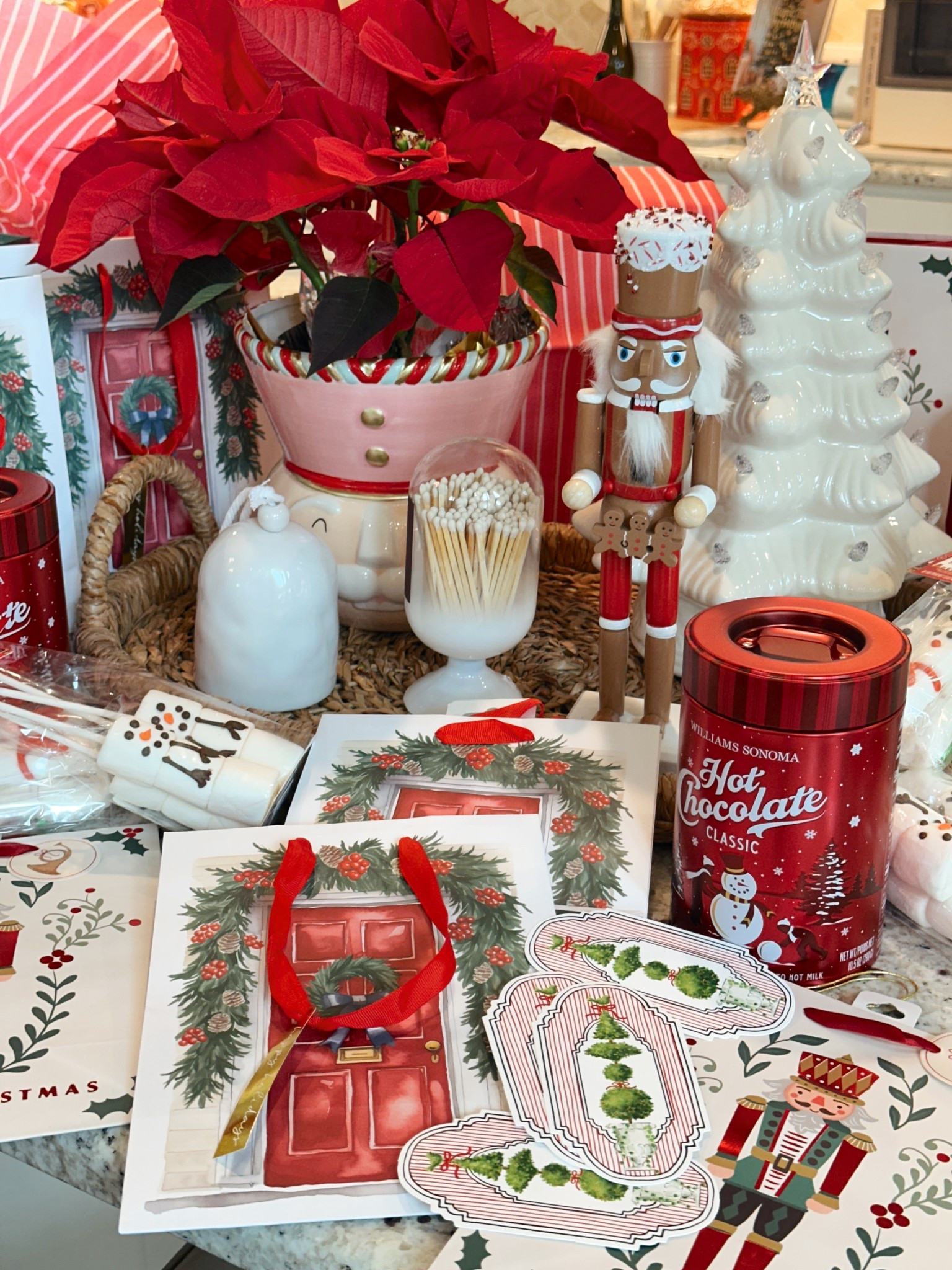 Easy gifting for your neighbors🏡🎄Cocoa & marshmallows with the cutest gift bags. 
Other ideas could be a favorite candle scent, a tea towel tied with a few recipe cards, their go-to cocktail mixer, homemade cookies, 🍪 a favorite seasoning, or plants like a Christmas cactus or Poinsettia🎁

The Styled Season, gift wrap, Christmas gifts, neighbor gifts 

#LTKHoliday #LTKSeasonal #LTKGiftGuide