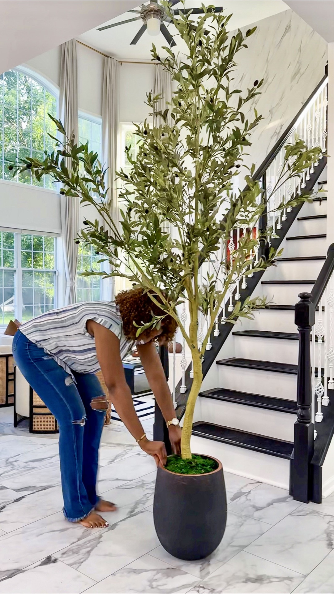 If you’re thinking of adding a plant or tree to your home, an olive tree is way to go. It gives that fresh, elegant and minimalist look to any space 💯

Tap below to shop! Follow me @omabelle for more Fashion, Home & everything inbetween. Glad to have you here!!! 💕😊🙏

Home | Home decor |Entryway decor | Entryway table | console table | Buffet table | Accent table
Pottery barn | Amazon home
Restoration hardware look for less |Luxe for less | Entryway ideas | Foyer table | Foyer decor | Sofa table | Black sofa table | Black console | Black accent table
| Black wooden table |Living room decor | Rugs | Area rug | Neutral rug | Living room family room rug | Sofa sectional | Washable cleanable sofa | Family friendly sofa furniture | Stain resistant fabric sofa | Cloud sofa | Family kid toddler | pet friendly sofa | Coffee table | Livingroom | Home decor | bedding | bedroom | fall decor |  fall porch | dresser | rug | kitchen | dispenser | cutlery set | knives

#LTKvlog #LTKHome #LTKdayinmylife