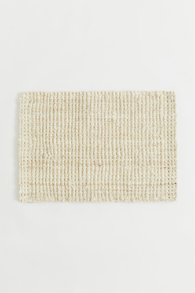 Doormat in braided jute with a slightly bubbly surface. Non-slip protection at back. | H&M (US + CA)
