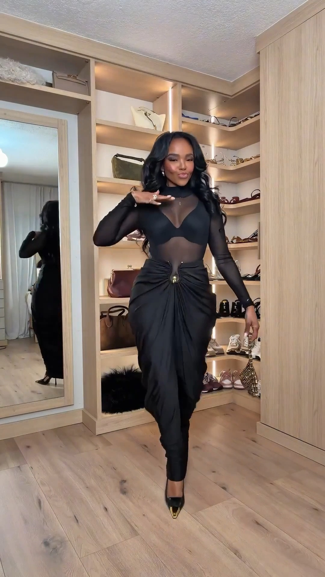 Valentine’s night, but make it sultry and elevated 🖤  
Sheer textures, sculpted draping, and a sleek all-black moment that feels bold, confident, and effortlessly sexy. This look is all about balance — soft mesh meets strong structure for a timeless yet modern vibe.

Perfect for Valentine’s dinner dates, cocktail nights, upscale lounges, or a chic night out.

📏 Measurements: 5'4", 138 lbs, 34D bust, 27" waist, 40" hips  
📏 Wearing size Small

Sheer black outfit, Valentine’s Day outfit idea, sexy black dress alternative, elevated night-out look, modern date night style, chic evening outfit.

Follow me on Instagram and YouTube @kirasfashionfinds