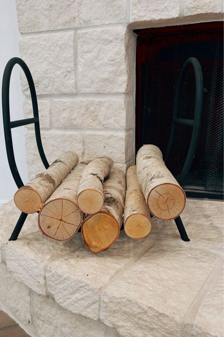Fireplace holder & fake wood on sale! 

#LTKHoliday #LTKsalealert #LTKhome