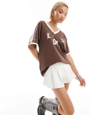 Lioness v neck sports jersey top in brown with white contrast trims | ASOS (Global)