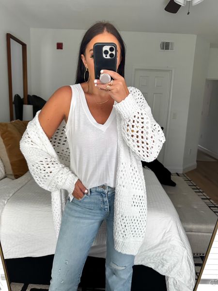 Supersoft Linen-Blend Skimming V-Neck Tank wearing size medium $34. Express Mid Rise Light Wash Ripped 70s Flare jeans wearing size 6 $88. Amazon Free People Dupe cardigan wearing size medium 