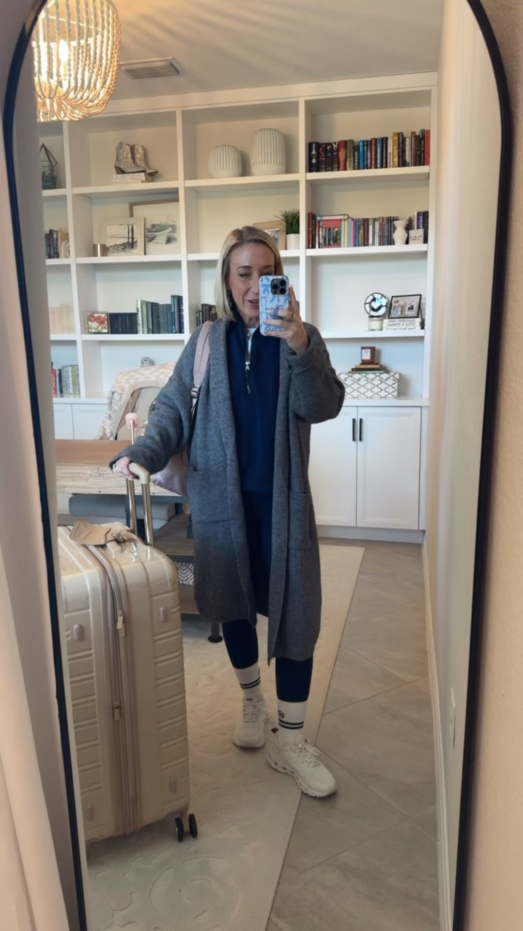My outfit to fly back to Ohio- 
• half zip pullover - size small. Code LTKSPANX for 20% off.
• bootyboost leggings - size small.
Code LTKSPANX for 20% off.
• sneakers - tts.
• travel backpack linked too!
• cardigan - mine is old but I linked a similar one. 

#LTKSpringSale #LTKSeasonal #LTKTravel