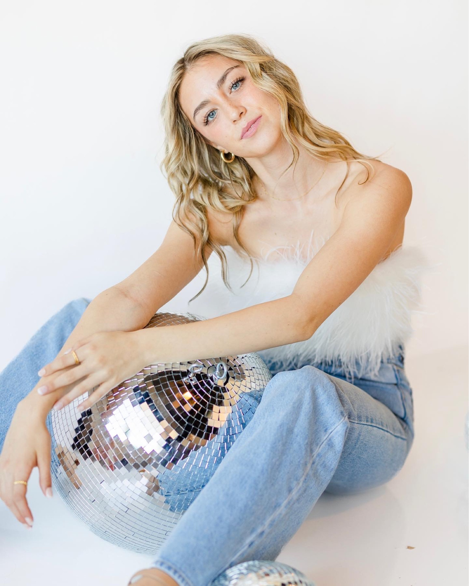 senior picture outfit! feathers and denim make for simple but stunning images! 

revolve rollas jeans feather tube top light was wide leg denim preppy senior photos simple classic classy outfit 

#LTKfit #LTKstyletip #LTKSeasonal