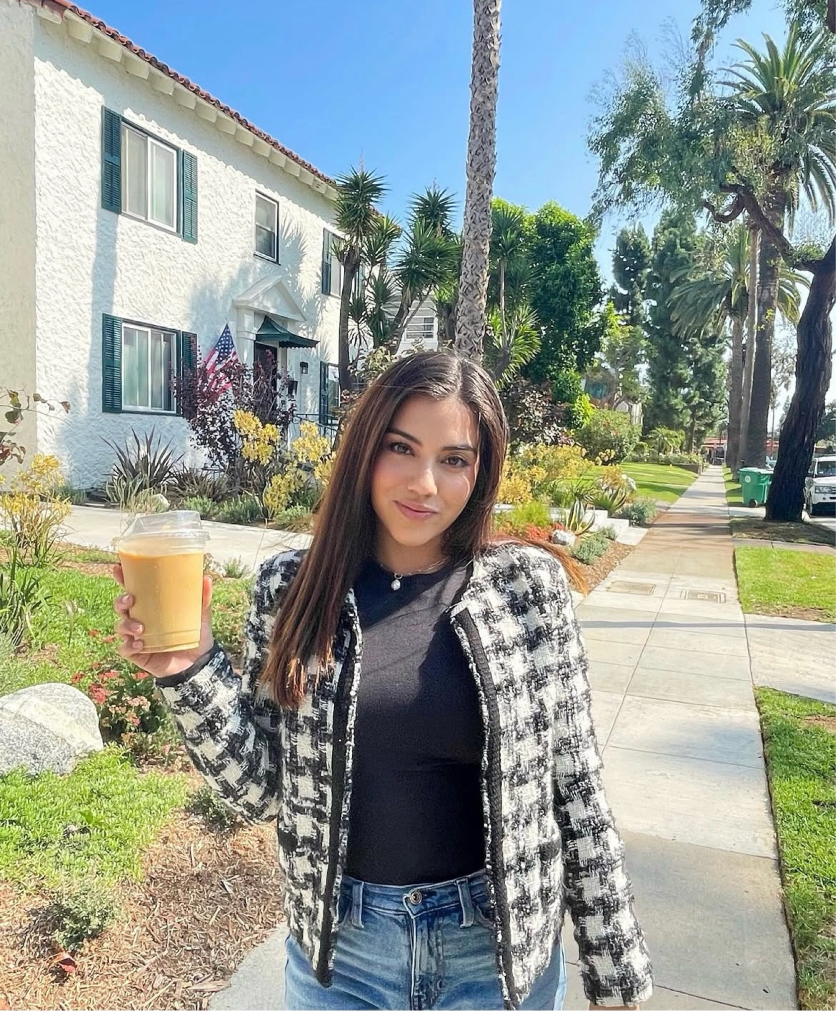Wearing a black-and-white tweed jacket with a structured fit and subtle embellishments, layered over a fitted black top. Paired it with high-waisted light-wash jeans, creating a casual yet polished office outfit look. #workoutfit #officelook

#LTKWorkwear #LTKFindsUnder100