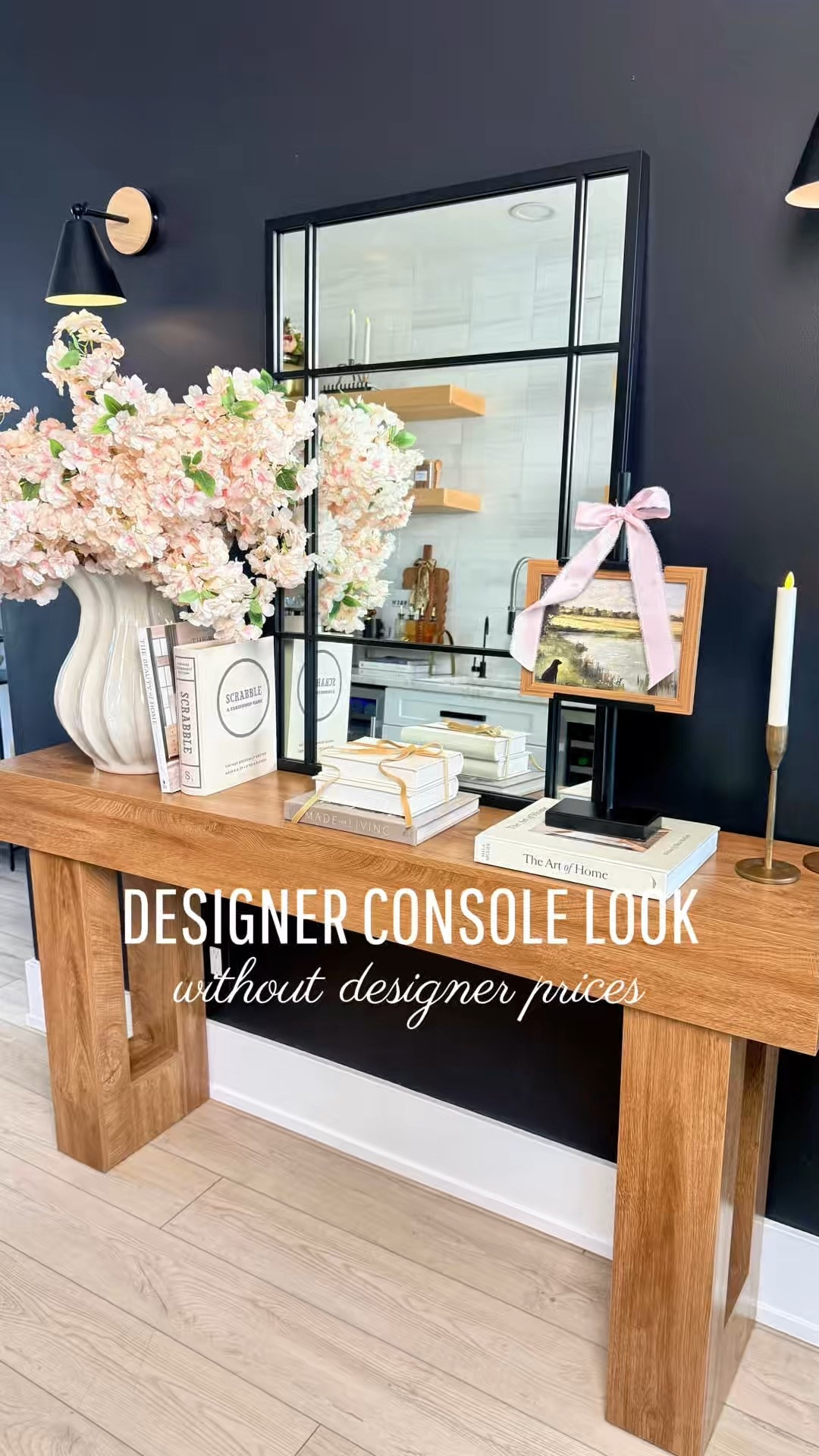 DESIGNER CONSOLE LOOK - without designer prices ✨

Follow @theshannykate_style for more daily inspo 💕

This is one of those stylings that instantly elevates a space without trying too hard. By mixing warm wood tones, soft florals, layered books, and a few simple accents, this console feels curated, timeless, and high-end. Yet everything is budget-friendly and easy to recreate. Proof you don’t need custom furniture or luxury price tags to get a designer look at home. ✨ 🌸

#LTKHome