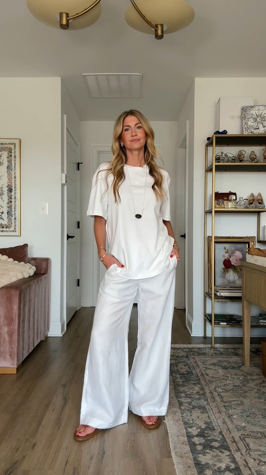Two white vacation looks. 

Over sized white tee: runs big, wearing S
Linen lodge pants: TTS, wearing S
Cotton balloon pant: TTS, wearing S
White tank: (out of stock, watching for a restock!) wearing S
Red sandals: TTS
Brown sandals: size a full size up 


#LTKgrwm #LTKootd #LTKTravel