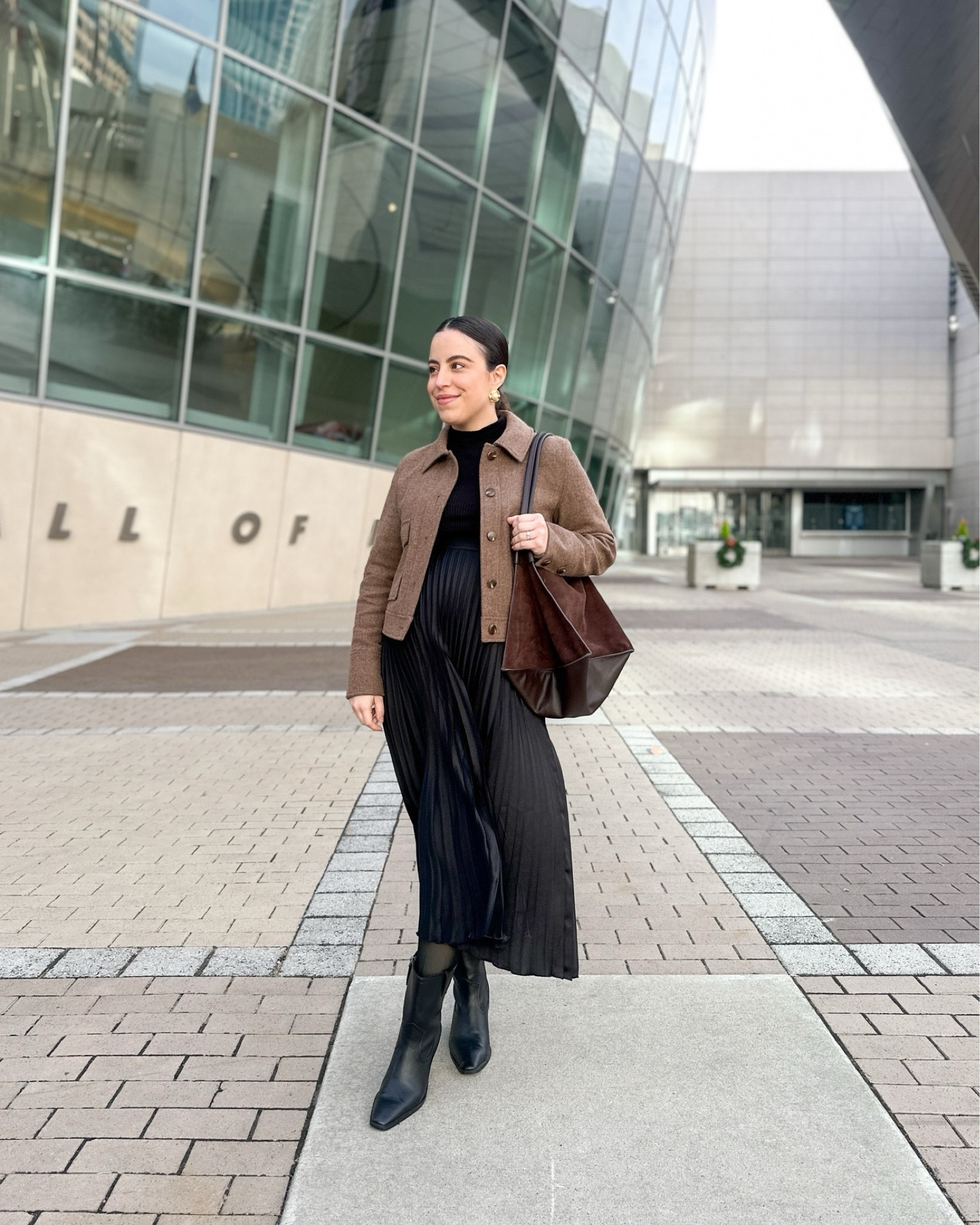 I’m loving this elastic waistband pleated skirt paired with a sleek black turtleneck and cozy wool cropped jacket! And can we talk about this amazing suede bag? Perfect for adding a chic touch to any ensemble! 
#fashionstatement #bumpstyle #chiclook #outfitinspo

#LTKSeasonal #LTKShoeCrush #LTKStyleTip