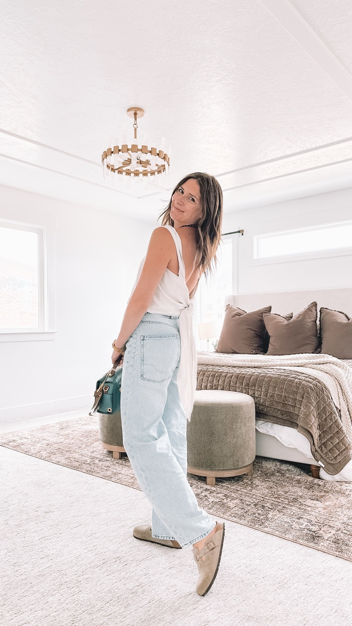 All it takes is a cute outfit and a coffee that tastes like sugar and I am the happiest. Light wash barrel jeans, a white tie tank top, loafers, and a teal bag — the perfect effortless everyday outfit for a Friday. Everything is linked and shoppable below!

#LTKgrwm #LTKmomlife #LTKootd