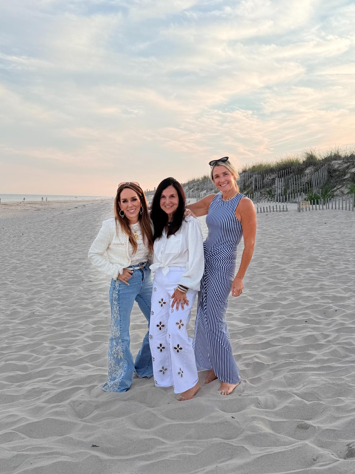 Sun, sand, and the ultimate lineup. 🌊 Clad in the Kaia Pearl High Rise Jeans, while the girls brought the drama in the Joplin Floral-Embroidered High-Rise Flare Jeans and the breezy Leni Dress. Nothing beats beach days with your favorites. 
#LTKunder100 #LTKunder50 #LTKstyletip #LTKbeach #beachday #ootd #summerstyle #denimstyle #beachoutfit #friendshipgoals #freepeople #shopthelook 

 #LTKootd #LTKSeasonal #LTKTravel