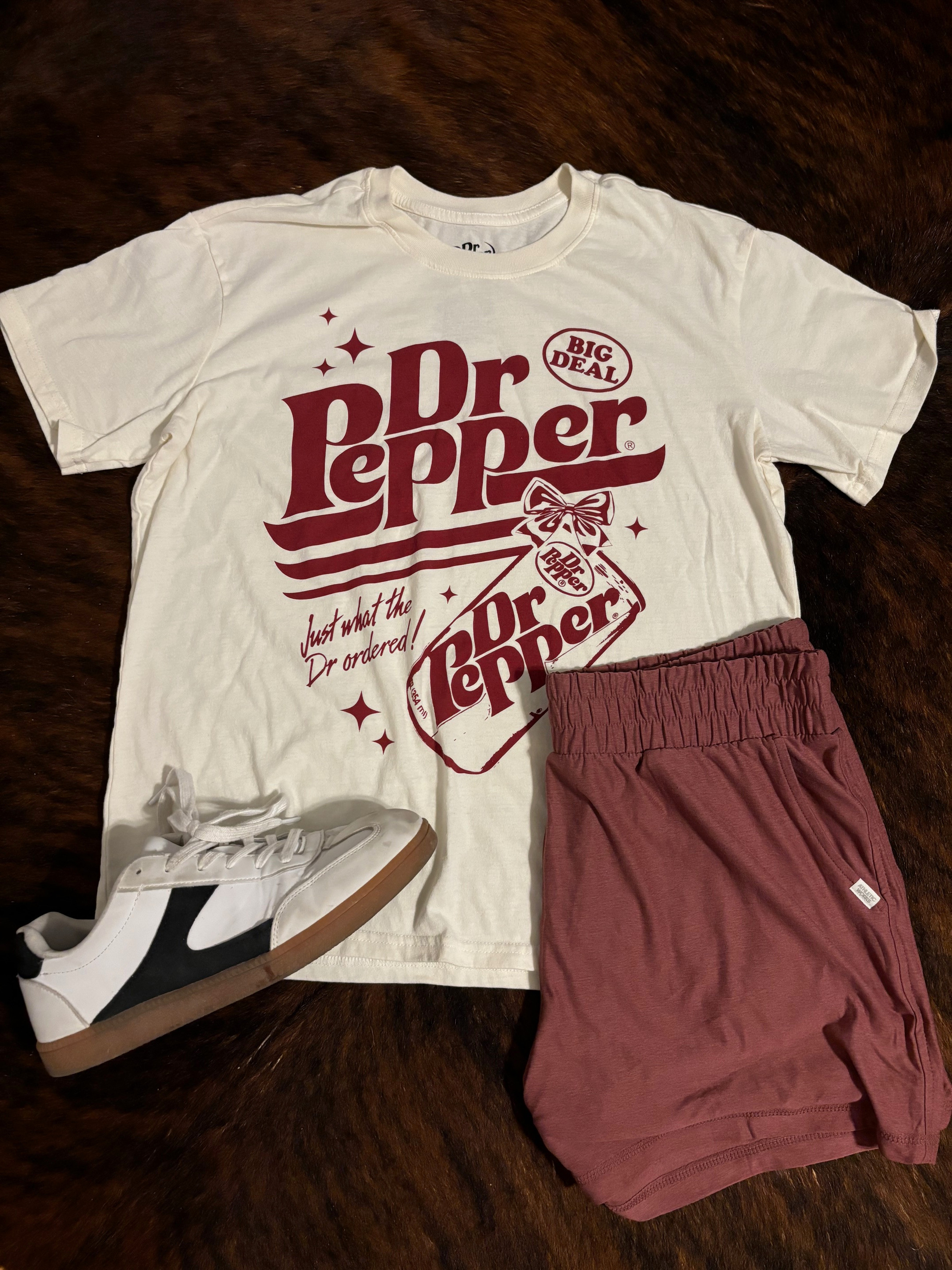 Casual Walmart look with the viral ButterCore shorts paired with a Dr Pepper tee and black and white tennis shoes. Such a fun, laid back outfit for everyday wear. 

 #LTKootd #LTKActive #LTKMidsize