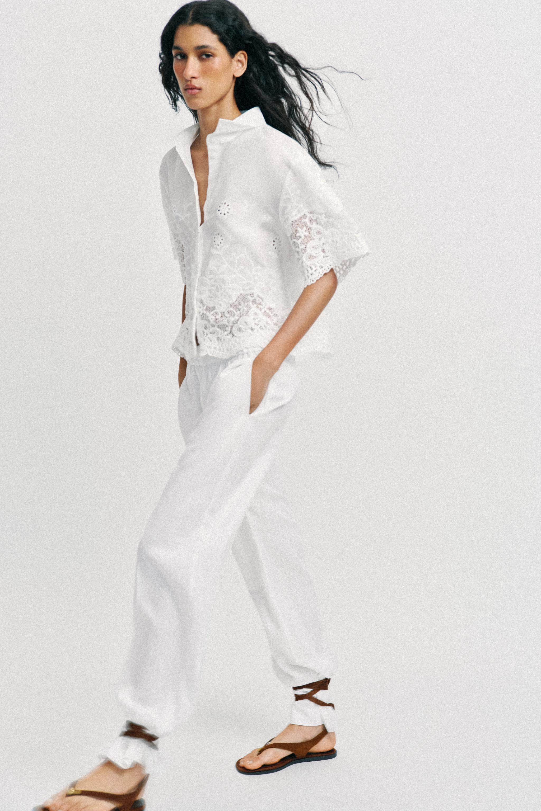Lapel collar shirt with short sleeves. Tonal embroidered eyelet detail. Front button closure. | Zara US
