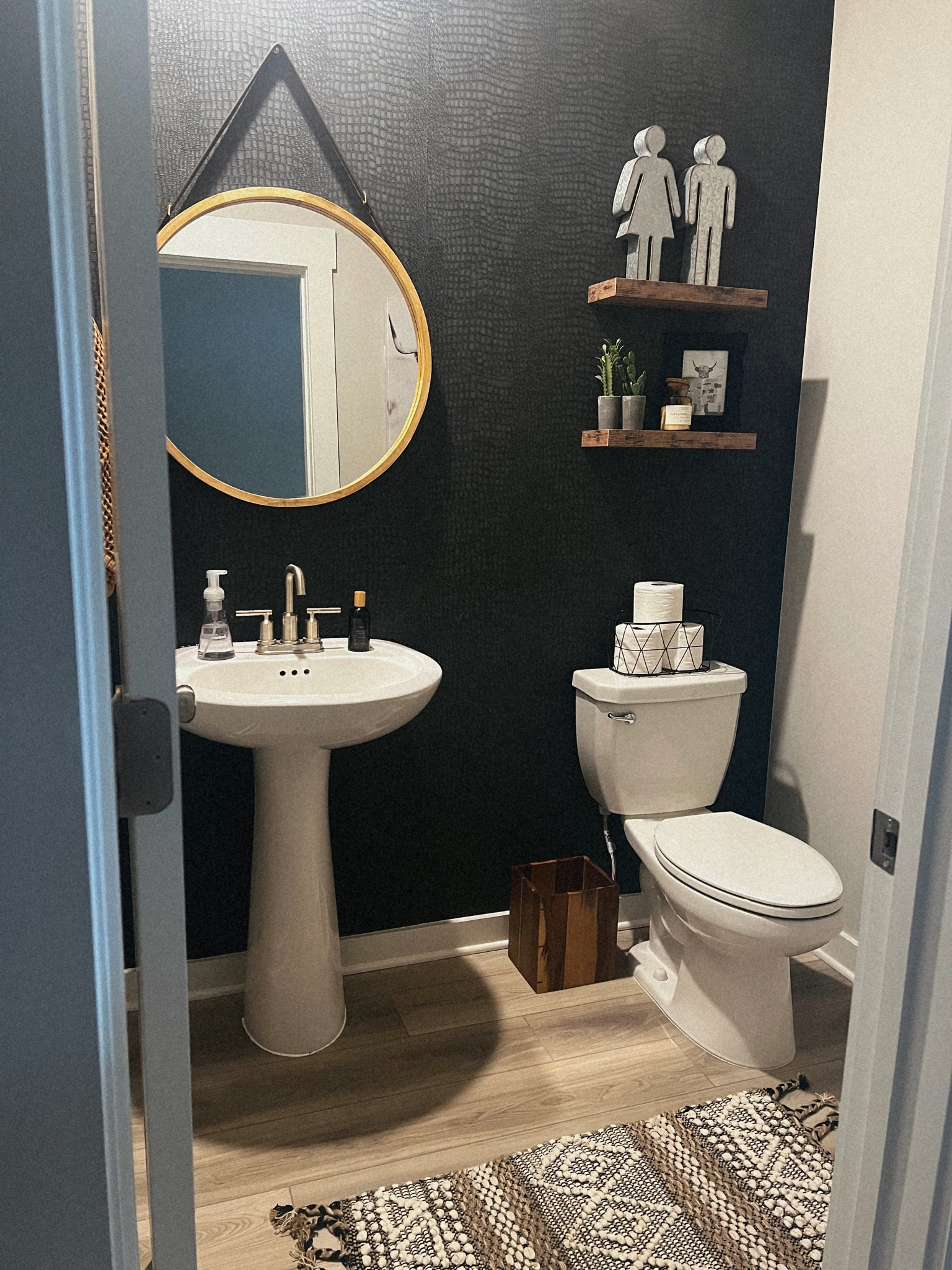 Nashville inspired funky bathroom with black wallpaper. 

#LTKunder100 #LTKunder50 #LTKhome