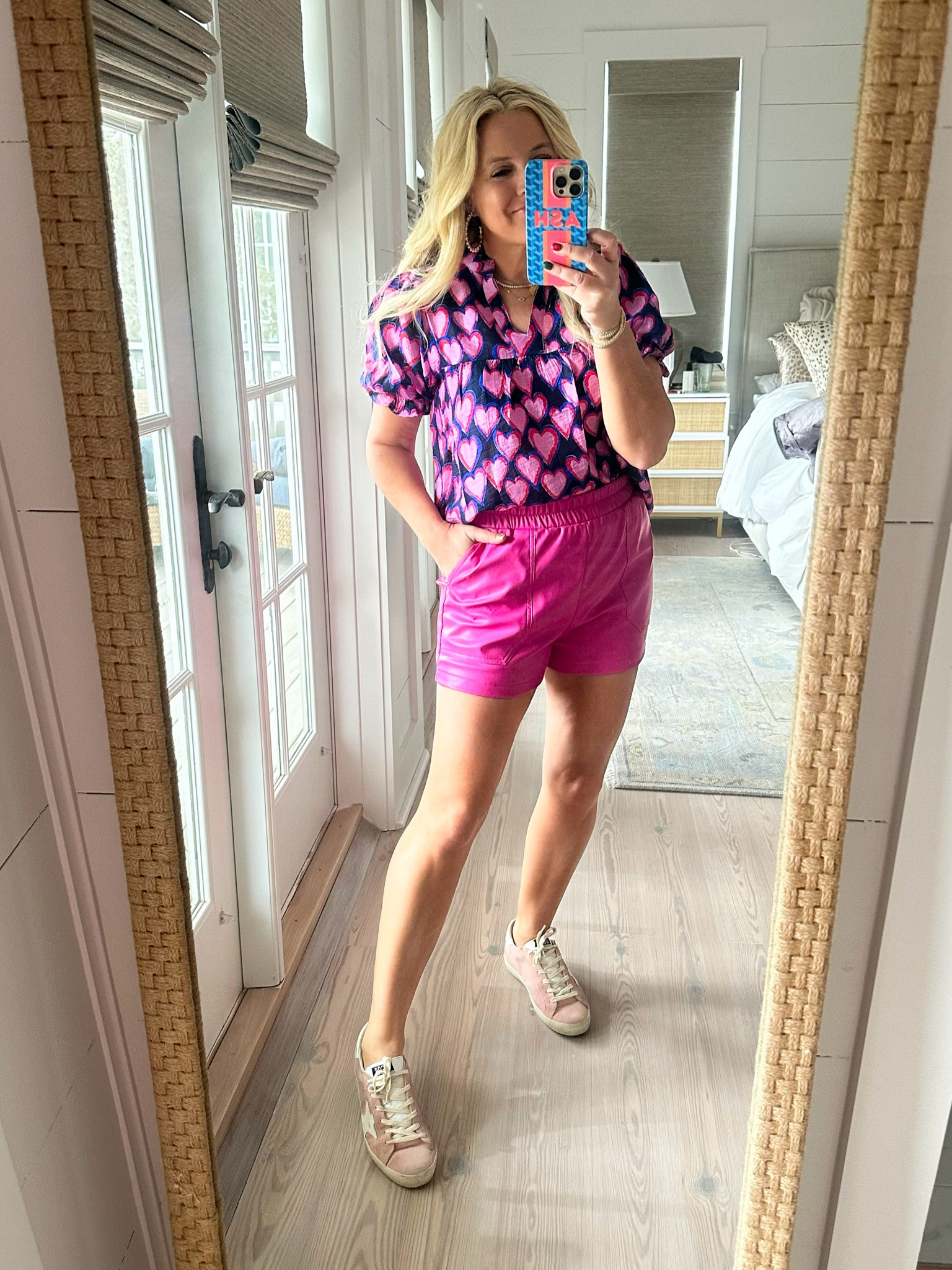 I am loving these pink faux leather shorts for spring into summer. This heart top is so cute and comes in two different color ways. I will link both for you! wearing a size small in both items and you can grab them both for 15% off with code Fancy15.

#LTKfindsunder100 #LTKstyletip #LTKSeasonal
