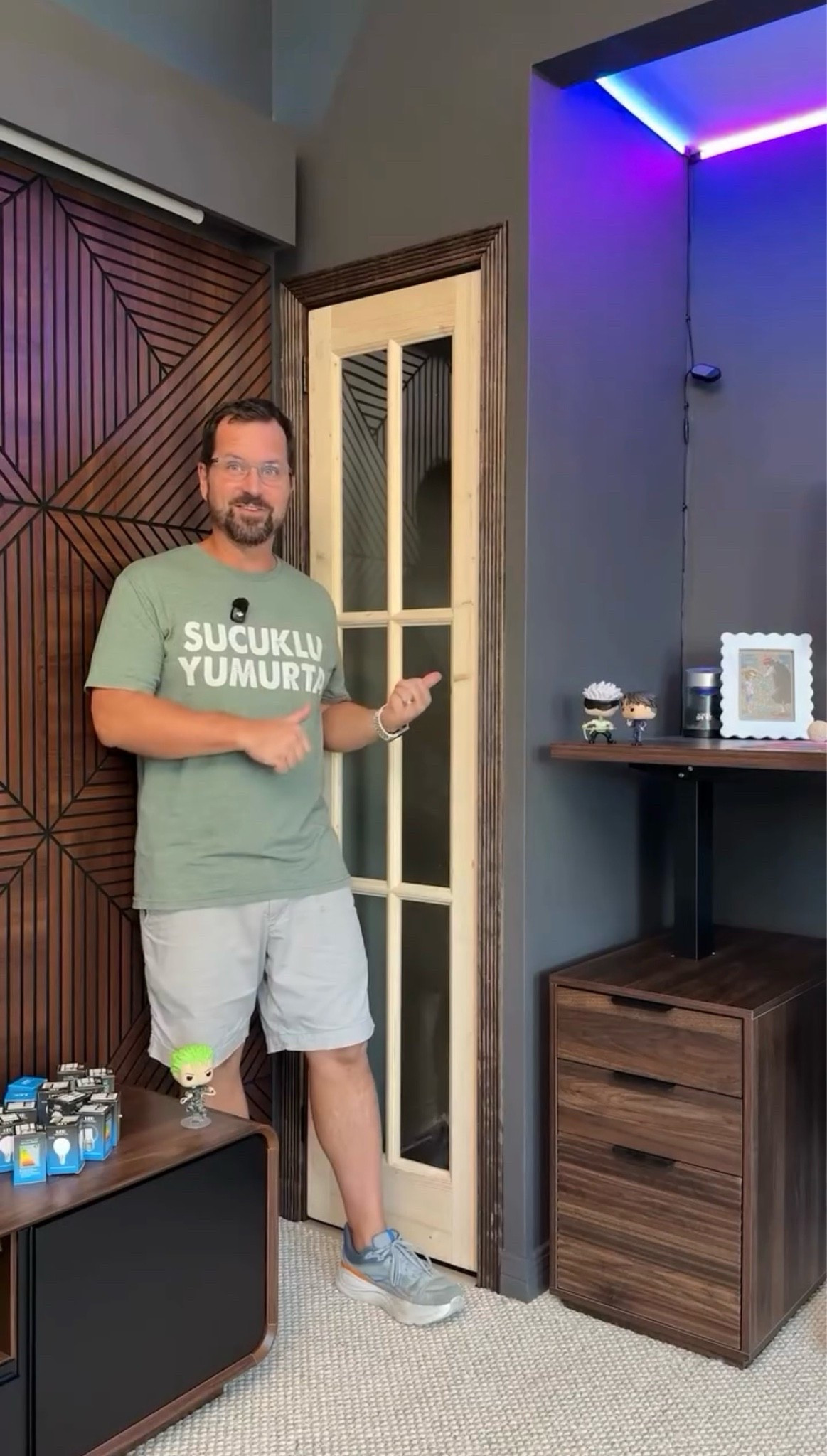 Gamer Room set-up, modern gamer room, console table, decorative wall panels, glass doors, cloud chandelier, standing desk, accent chairs #gamer #gameroom #diyhome

#LTKHome #LTKdayinmylife