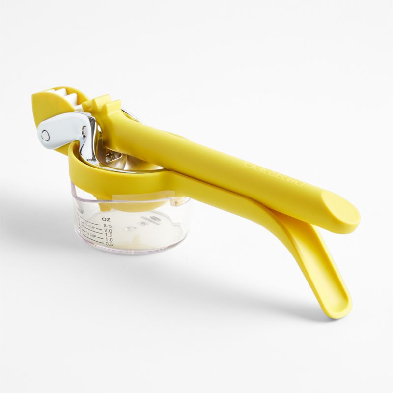 Crate & Barrel Citrus Squeezer with Measuring Cup + Reviews | Crate & Barrel | Crate & Barrel