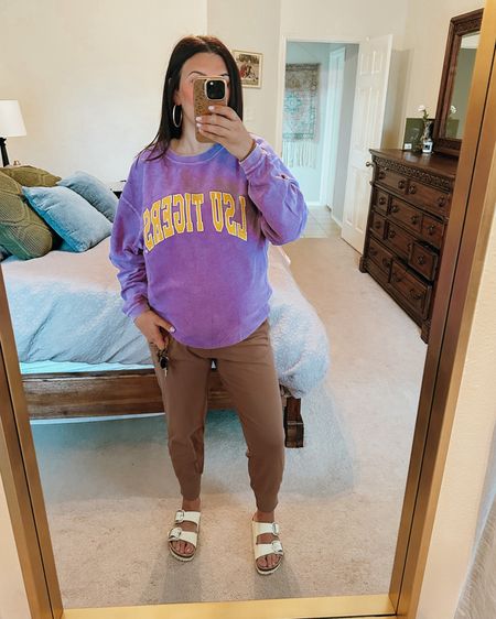Bump, friendly, work outfit! Wearing a large in my LSU sweatshirt and medium in my joggers from Athleta. I have them rolled down for the bump! Also, sharing my cream, Birkenstocks and sharing a pair. That’s also a perfect spring shoe  

Teacher outfit 
School outfit
Social worker outfit 

#LTKshoecrush #LTKbump #LTKworkwear