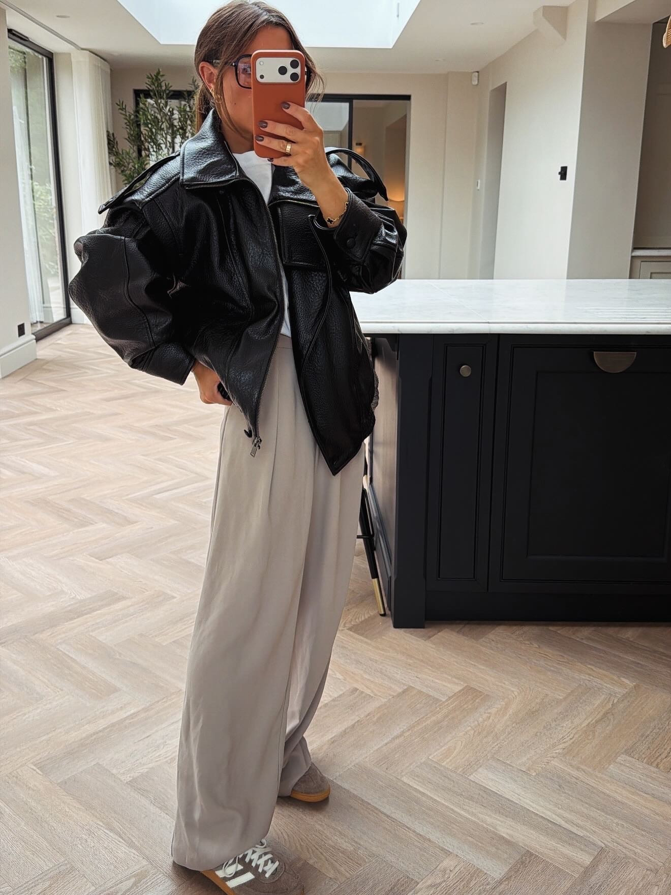 Nude tones, beige trouser, leather jacket, black jacket, white t shirt, adidas trainer, everyday style, ysl glasses, autumn outfit 

#LTKautumn #LTKeurope