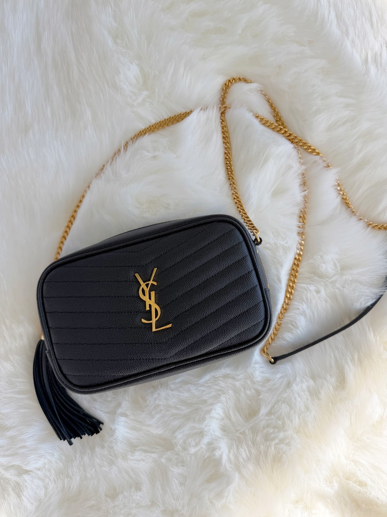 Splurge worthy handbag! Love this YSL Mini Lou bag for special occasions, wedding guest outfits, holiday party outfits,  New Year’s Eve outfits, date night outfits and everyday wear. Fits a larger size phone, small wallet or card case, keys and lip gloss. Such a nice splurge gift for her for the holidays too! 

#LTKWedding #LTKHoliday #LTKGiftGuide