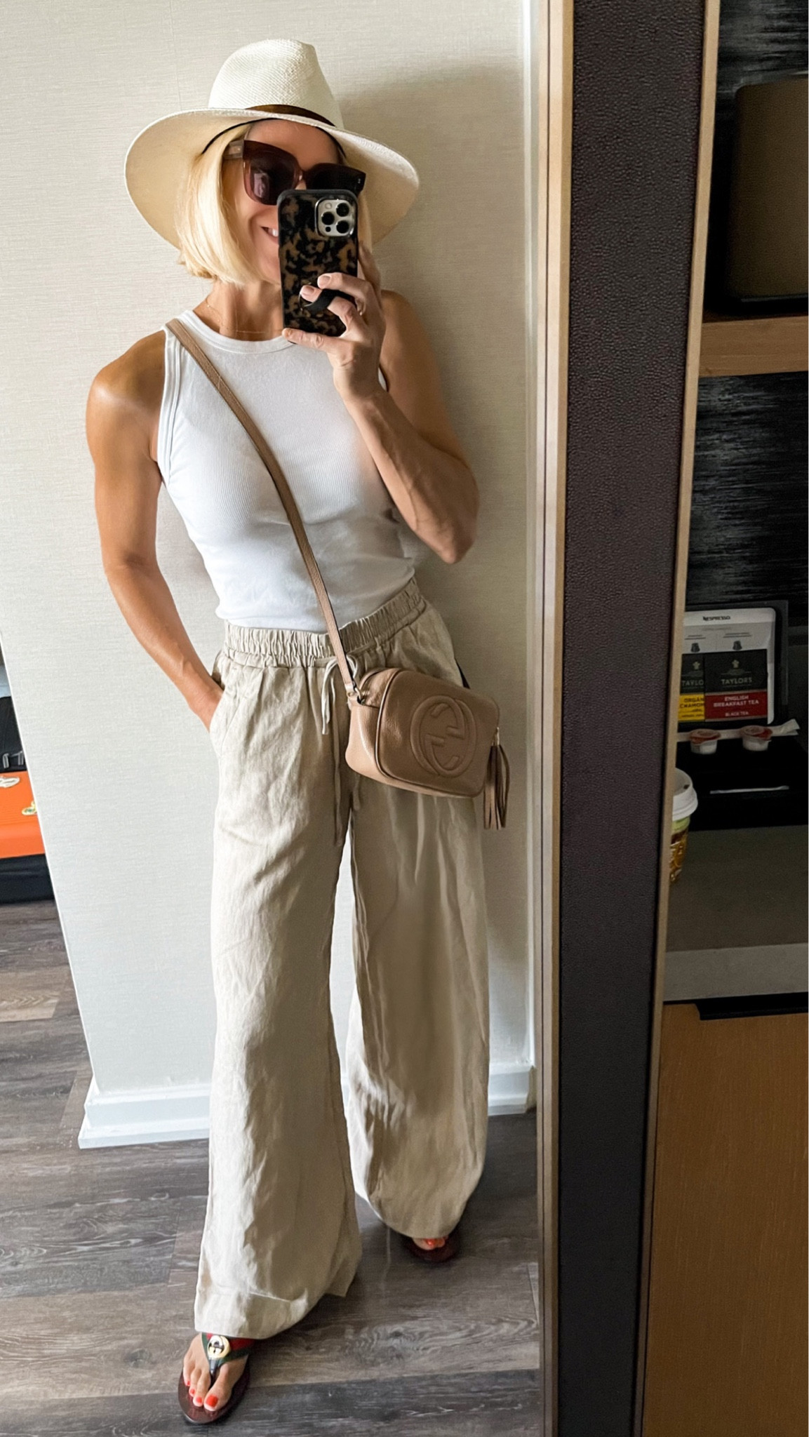 Budget friendly neutral outfit. 
Tank runs tts, size down in pants 
Sandals run tts. 

#LTKtravel #LTKSeasonal #LTKFind