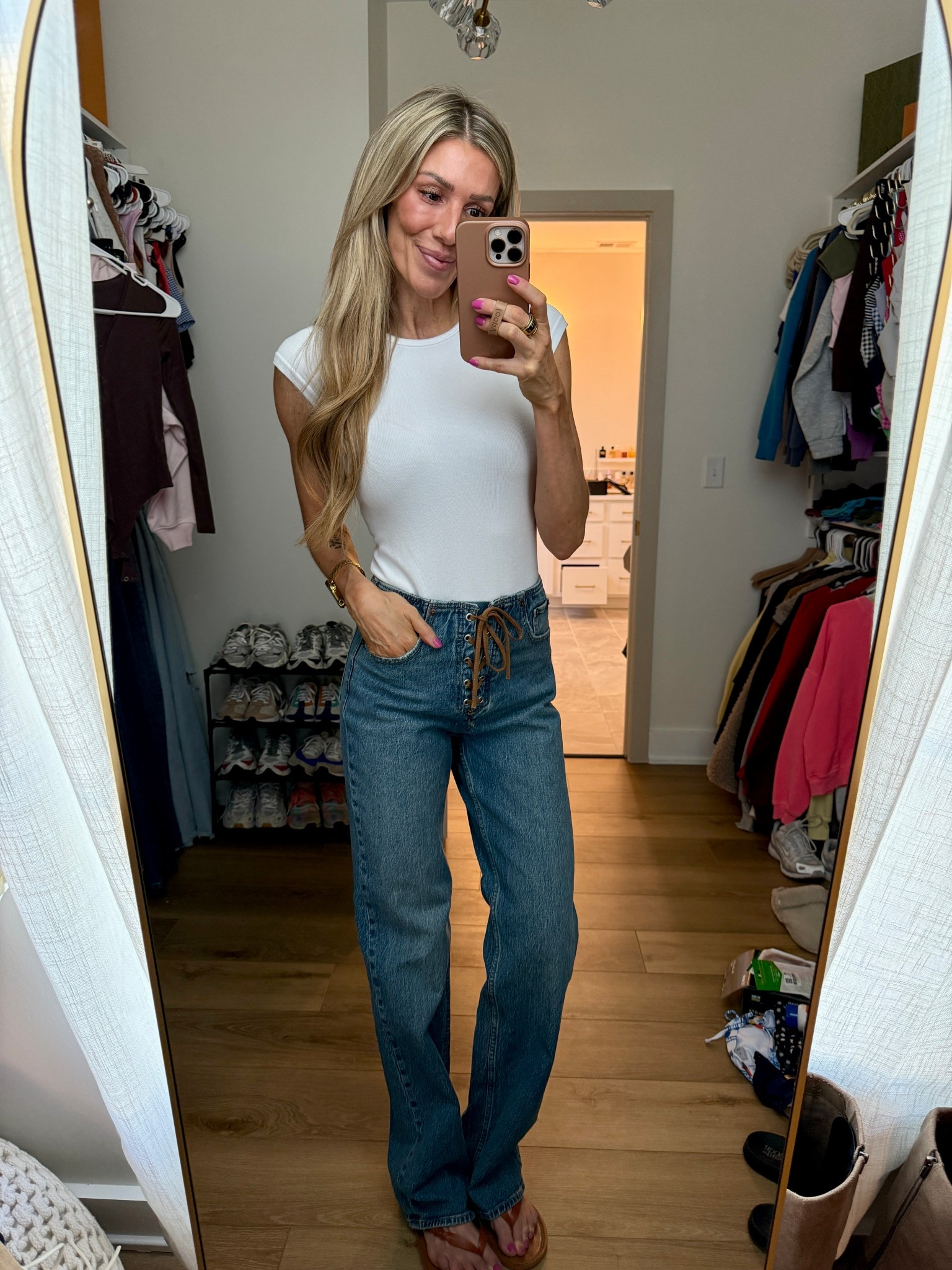 Small bodysuit 
25 regular jeans 