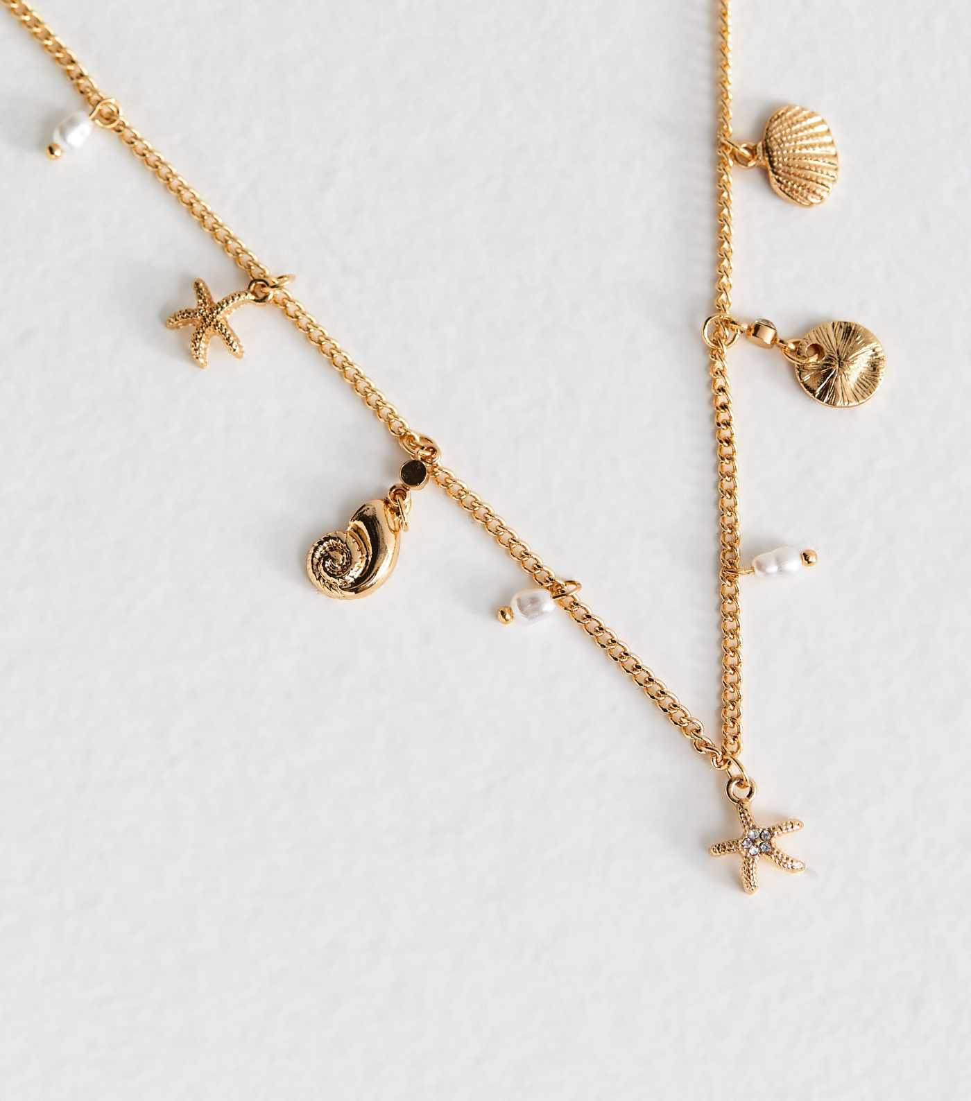Gold Tone Shell Charm Necklace | New Look | New Look (UK)
