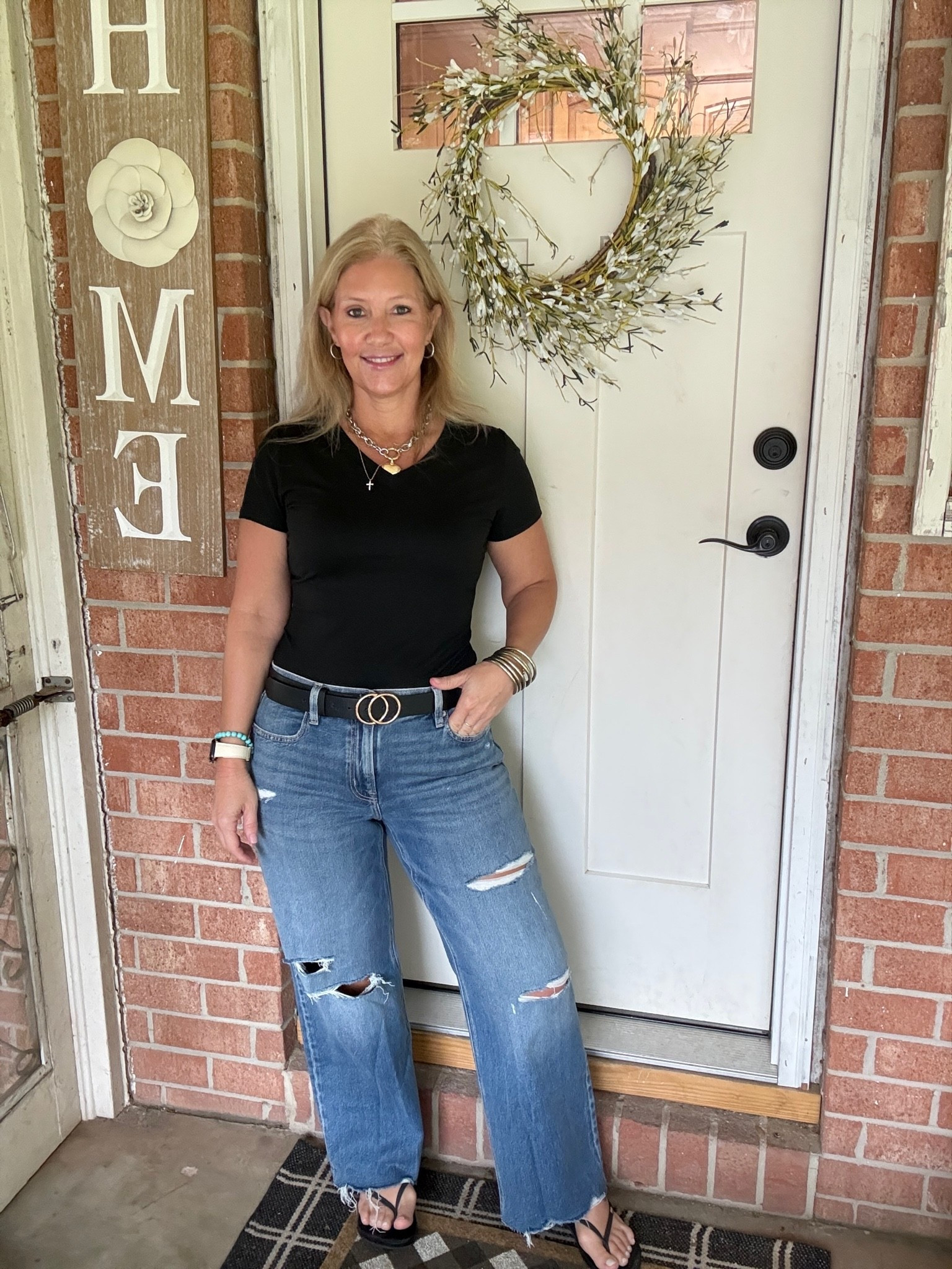 Keeping it simple with pieces I reach for again and again 🤍🖤

This look starts with my favorite high-rise stovepipe jeans from American Eagle (size 10) paired with a Trendy Queen basic tee (size medium). Added my go-to Reef sandals, layered mixed-metal jewelry, an Apple Watch band from Amazon, and a statement belt for an easy everyday outfit that looks put together without trying too hard.

#LTKootd #LTKOver40 #LTKSaleAlert