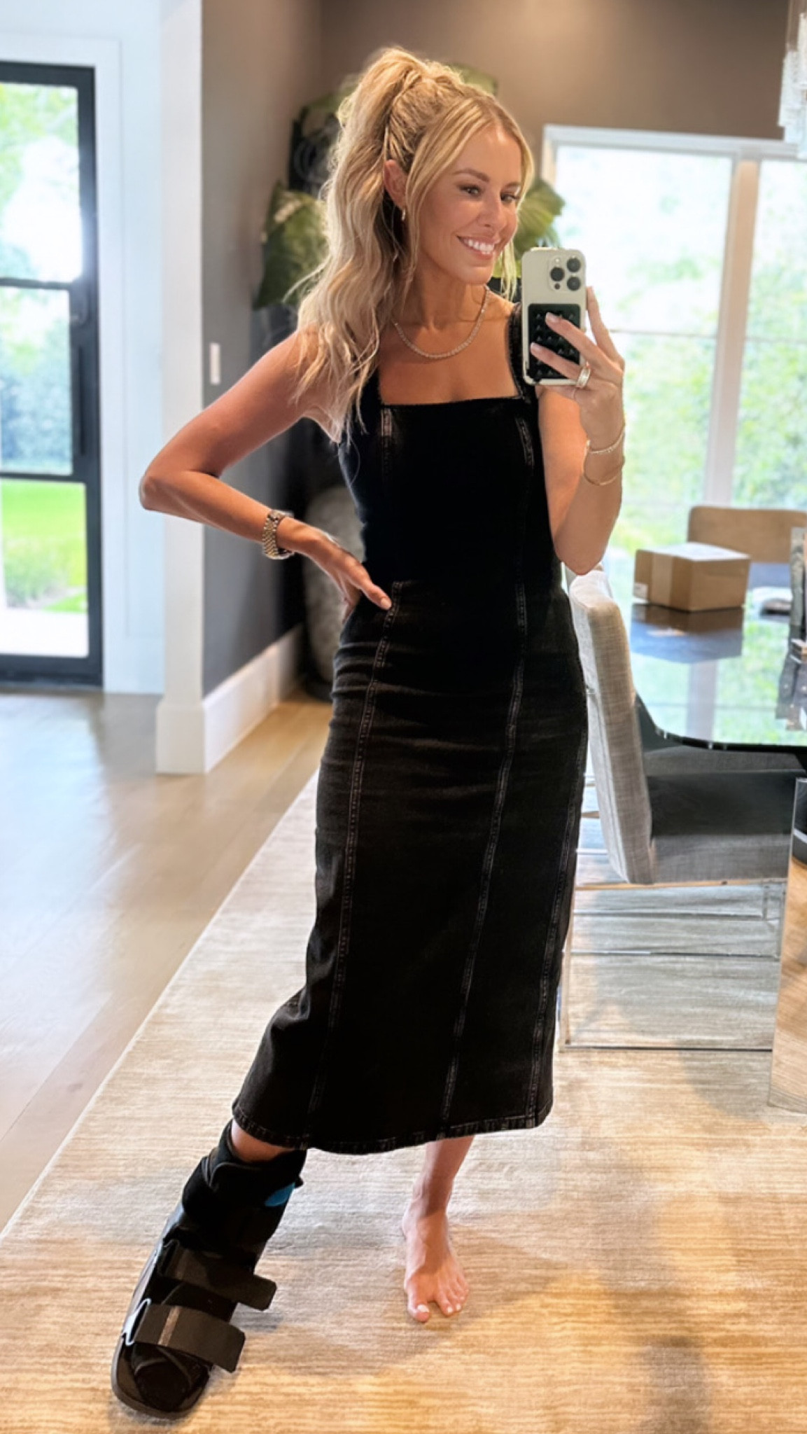 The orthopedic boot is really KILLIN MY VIBE. So many cute shoes I COULDVE WORN with this black denim dress, but nope…instead, im chained to this thing for 3 more weeks. In other news, this dress is stretchy and sexy, yet conservative and office appropriate (throw a blazer over it!)…can’t wait to layer with a belt & a turtleneck bodysuit underneath when cooler temps hit! // sizing: dress/small, regular length (comes in traditional denim color, as well as petite and tall lengths!)

#LTKover40 #LTKworkwear #LTKSale