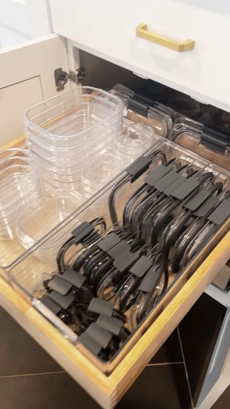 New pullout drawers added and deep drawer bins to keep Tupperware organized. Kitchen organization

#LTKVideo #LTKHome #LTKFindsUnder50
