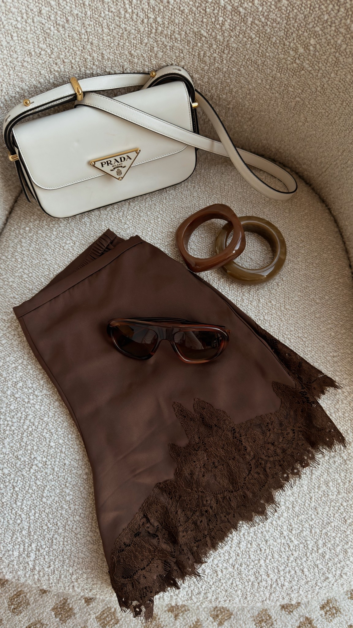 Instantly elevate your look with a little lace and satin! Super feminine, I love pairing more “boy-ish” pieces with it! Linking a similar ba to my oldie Prada one 

#LTKSeasonal #LTKOver40