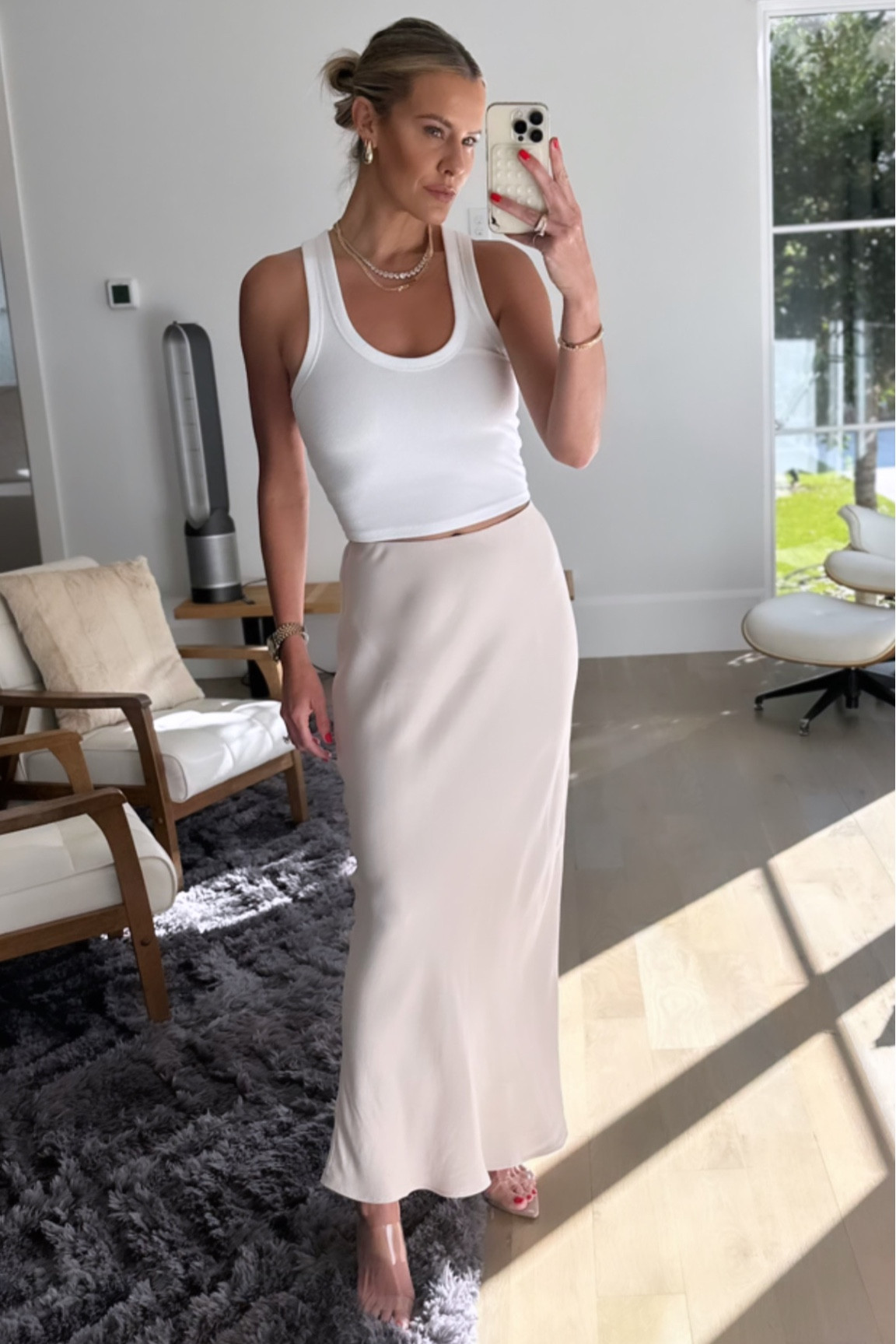 Simple, clean, & chic in white & cream for a summertime date night🤍🤍// Sizing: tank/small, skirt/xsmall (size down!) // FYI this skirt is part of the LTKxAnthropologie sale! Save 20% by copy & pasting the in-app code! 

#LTKsalealert #LTKunder100 #LTKxAnthro