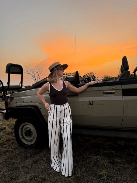 New stripe linen trousers and tank for sunset hour on safari 

#LTKSeasonal #LTKtravel