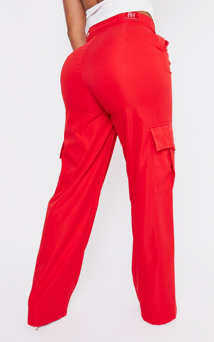 PRETTYLITTLETHING Shape Red Buckle Detail Cargo Wide Leg Pants | PrettyLittleThing US