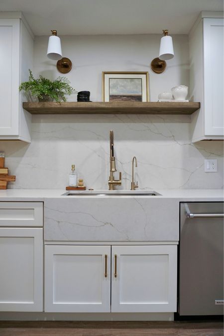 Kitchen sink, floating shelf, sconce lights, sink faucet, cabinet hardware, shelf decor and more! 

#LTKhome