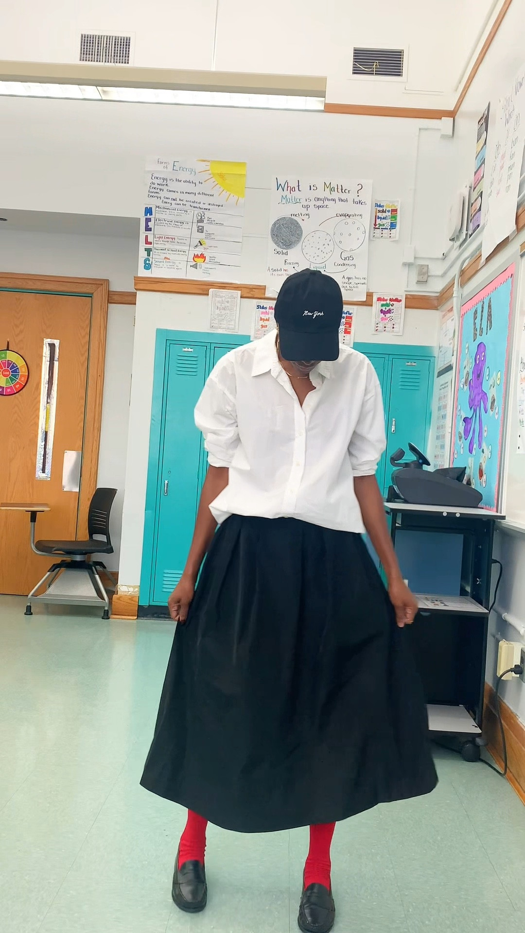 This black skirt and oversize shirt outfit is the perfect balance of polished and effortless. A classic black skirt paired with an oversized button-down, creates an easy modern look that works for workwear, brunch or everyday wear. Flattering and comfortable, easy to dress up or down great for work or casual days style it with flats for daytime or heels for more elevated. Look this outfit feels put together with a pop of color from the red sock. #LTKBlackoutfit #LTKBlackskirt #LTKOversizedshirt

#LTKWorkwear #LTKootd #LTKOver40