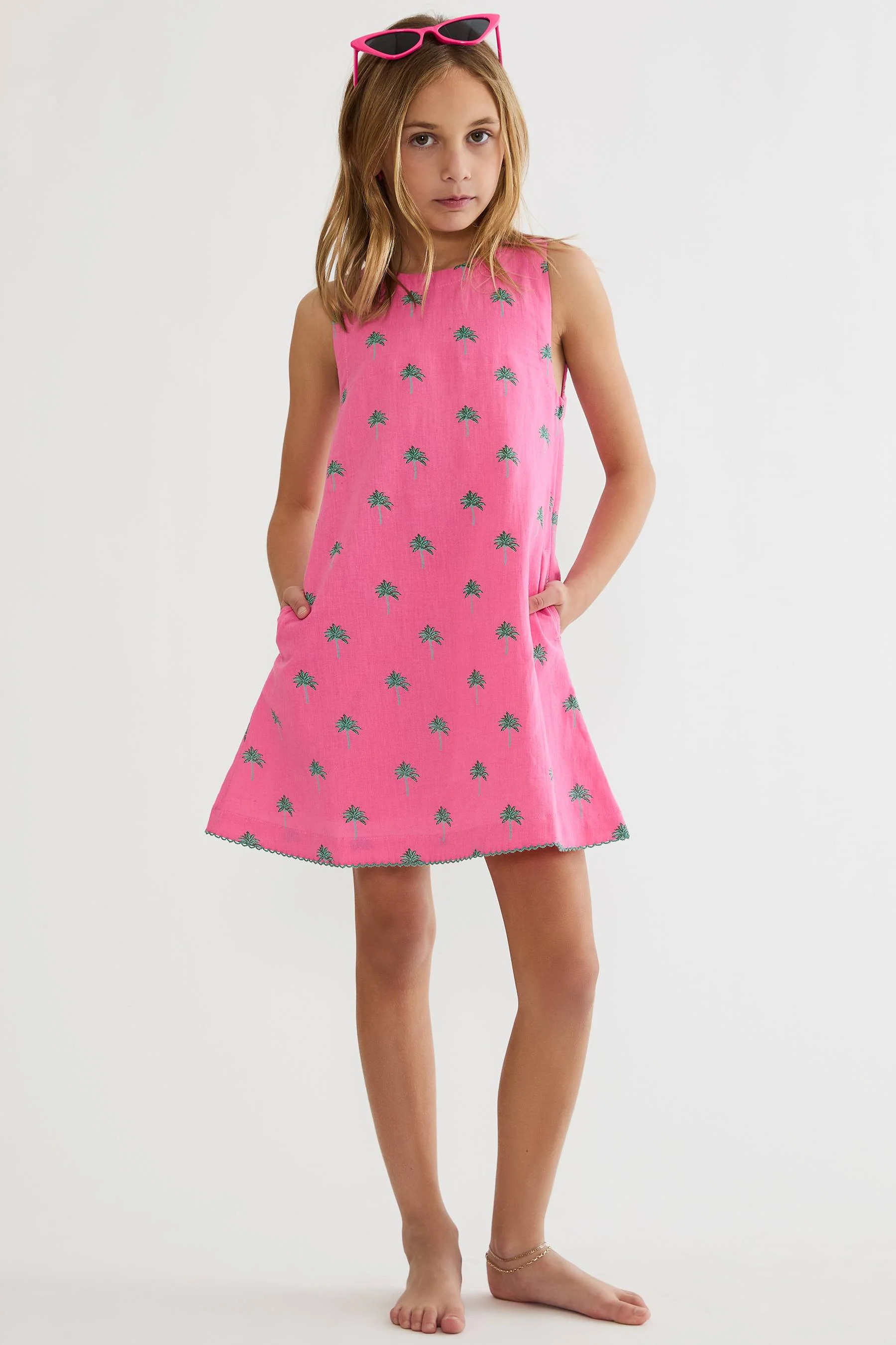Little Caprina Dress Flamingo Fronds | Girls Cotton Linen Palm Print Dress | Beach Riot | Beach Riot